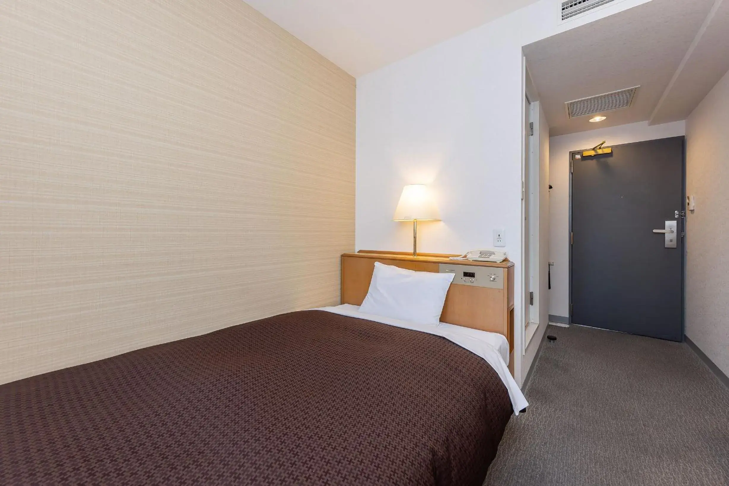 Bed in Ace Inn Matsumoto Bed in Ace Inn Matsumoto