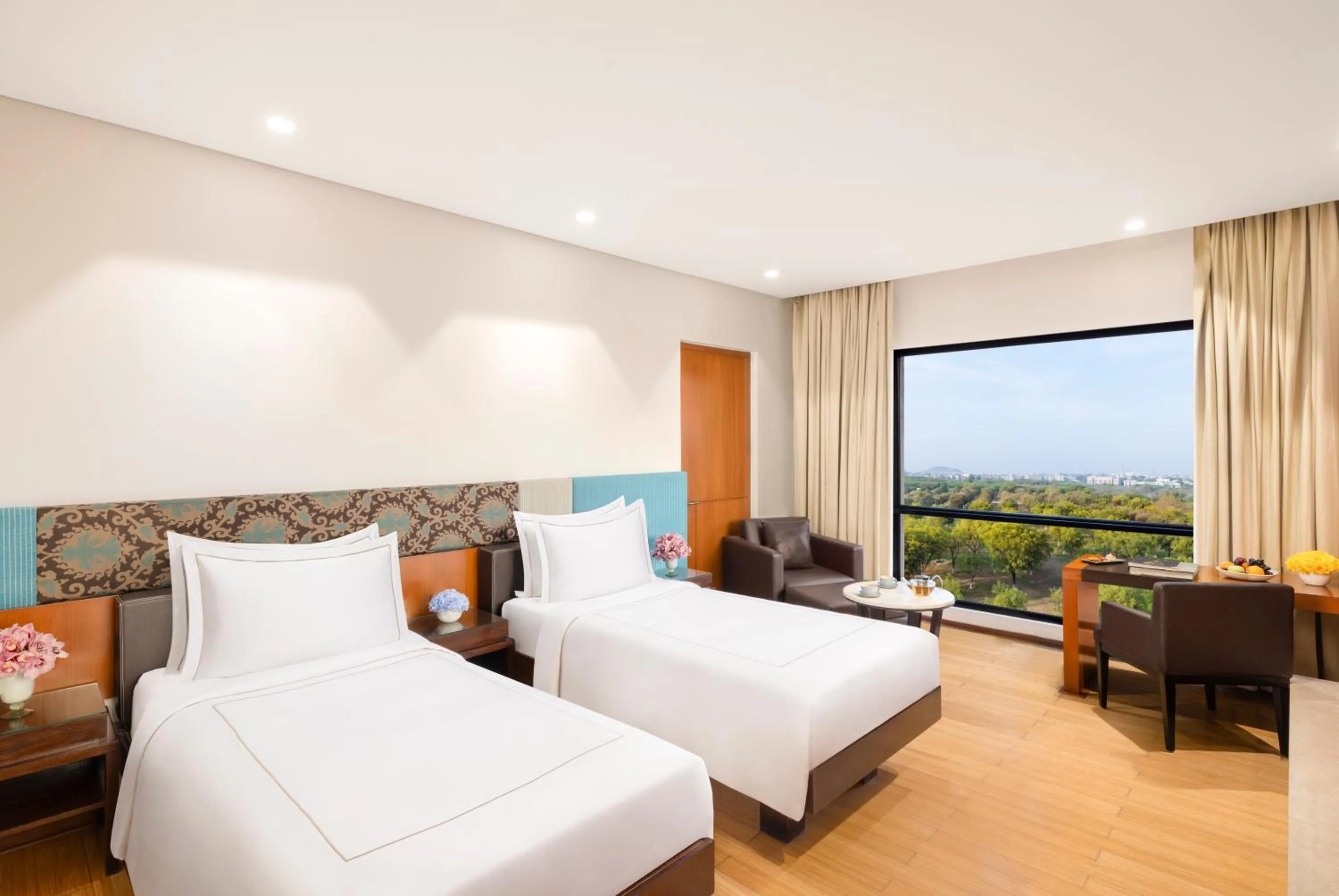 Bed in Taj Surajkund Resort & Spa, Delhi NCR