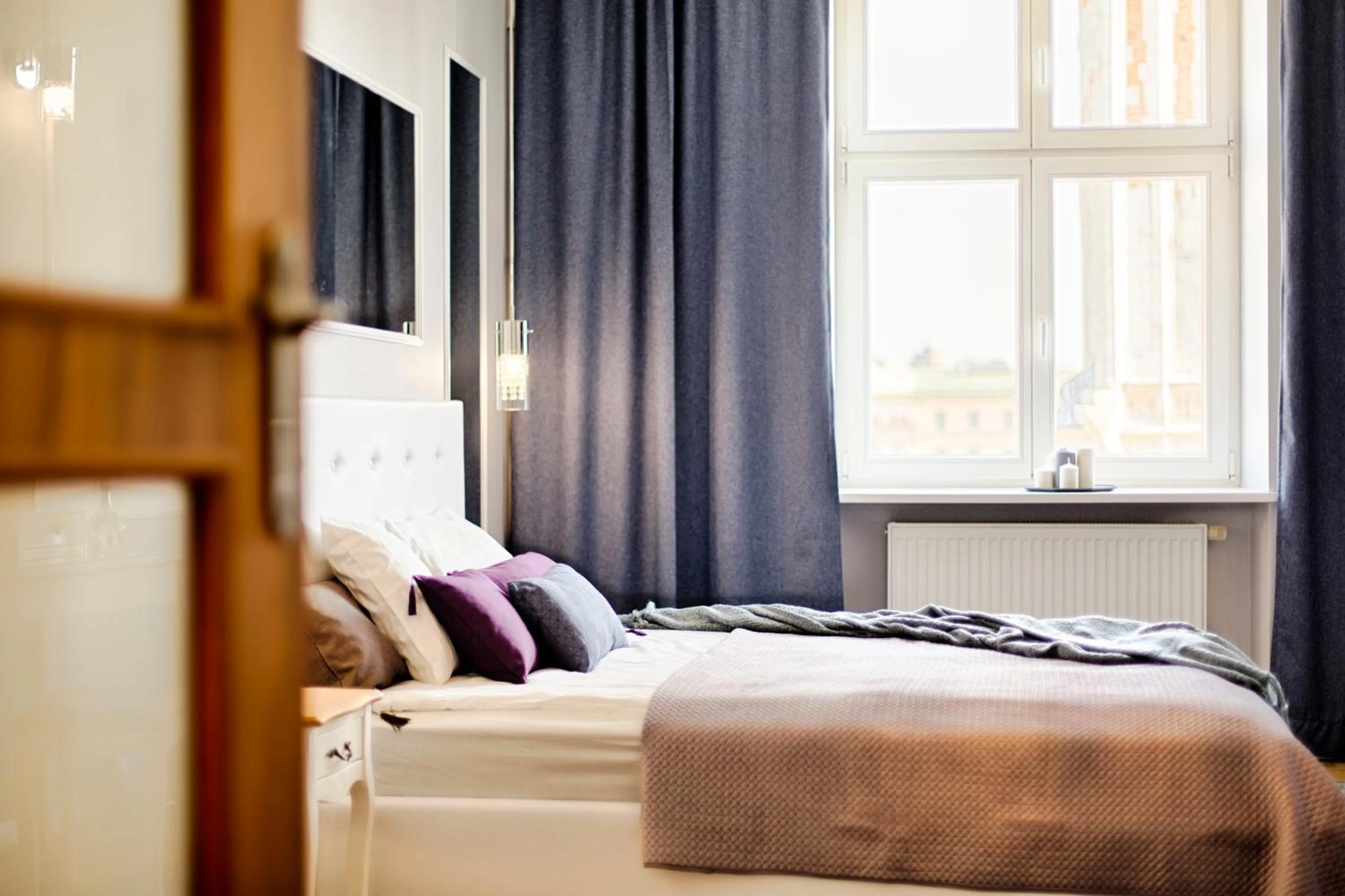 Bed in Main Square Apartments