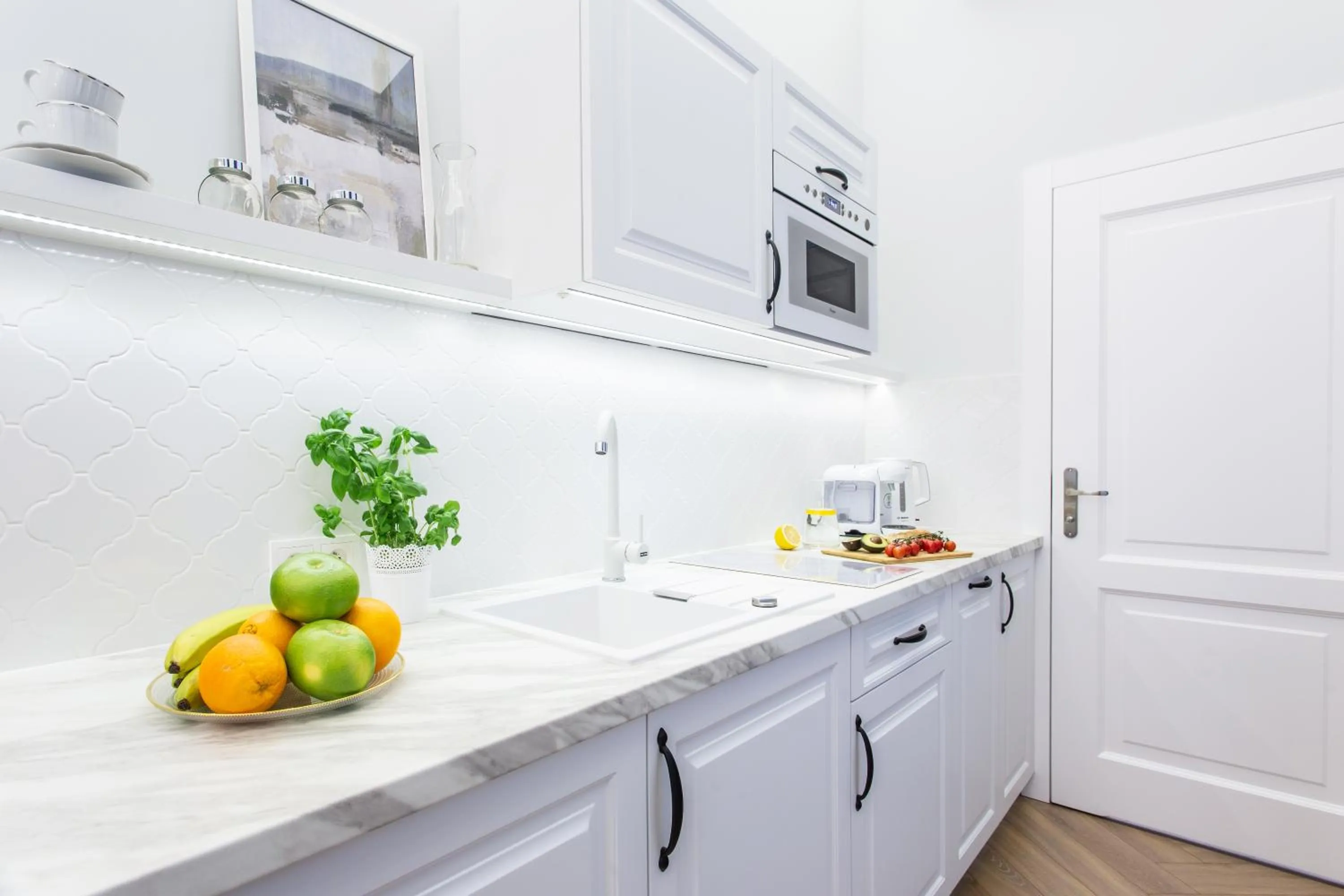 Kitchen or kitchenette in Main Square Apartments