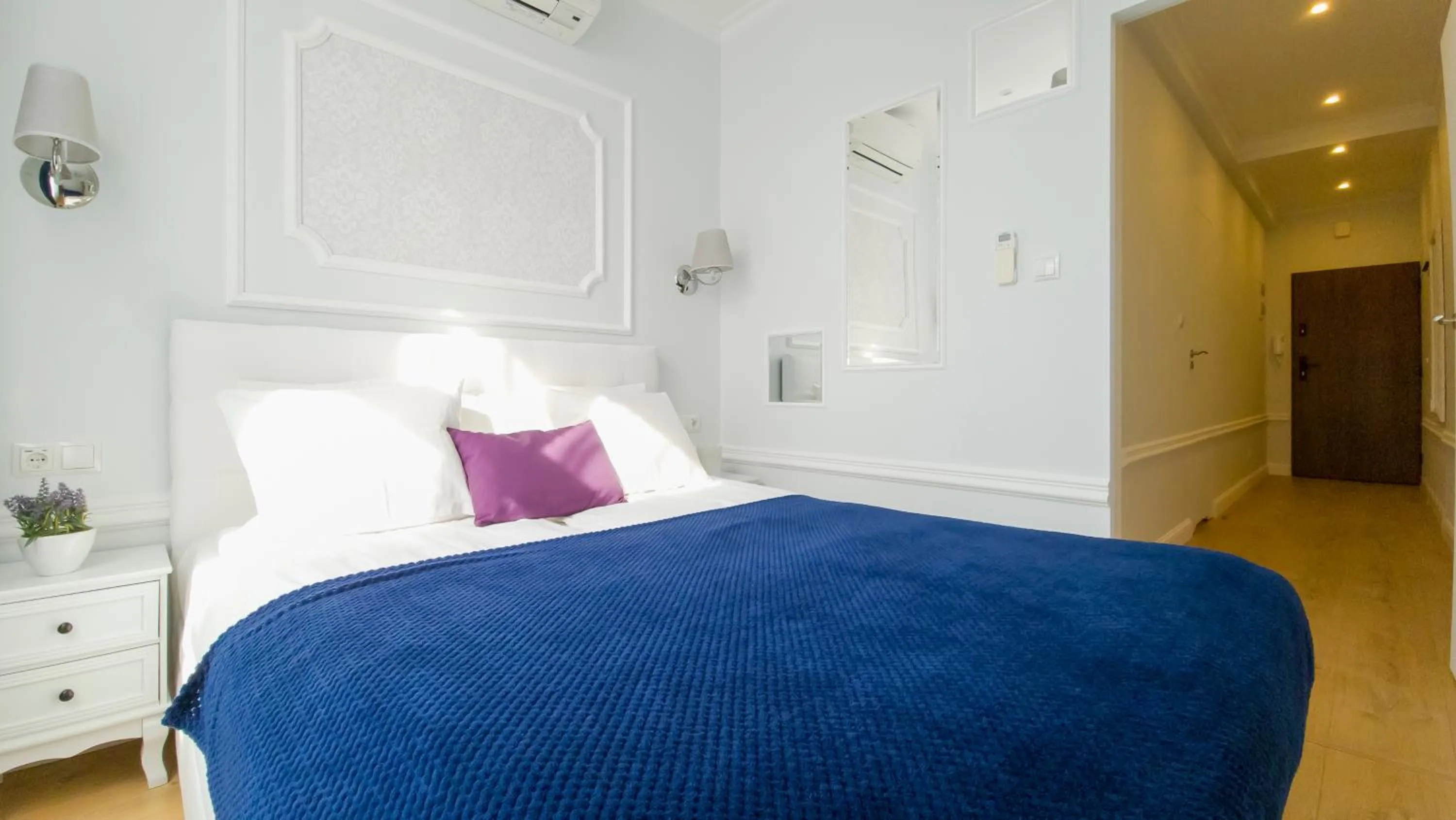 Bed in Main Square Apartments