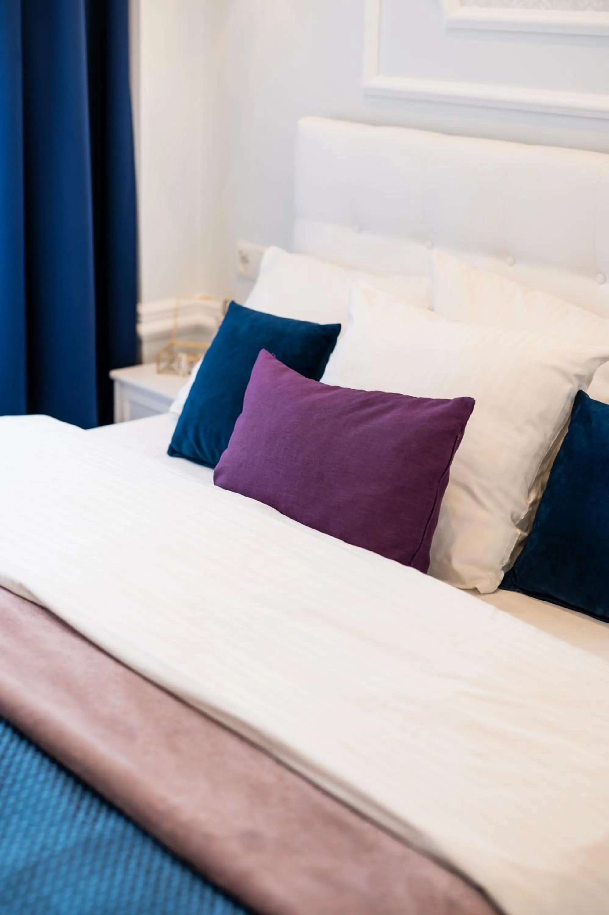 Bed in Main Square Apartments