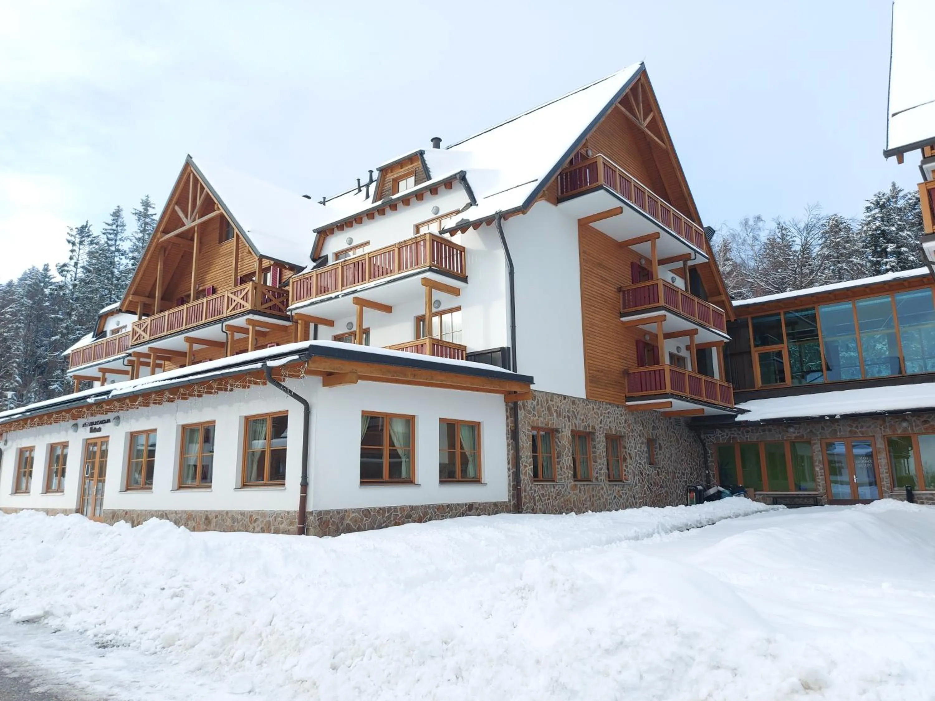 Property building in Pohorje Village Wellbeing Resort - Wellness & Spa Hotel Bolfenk