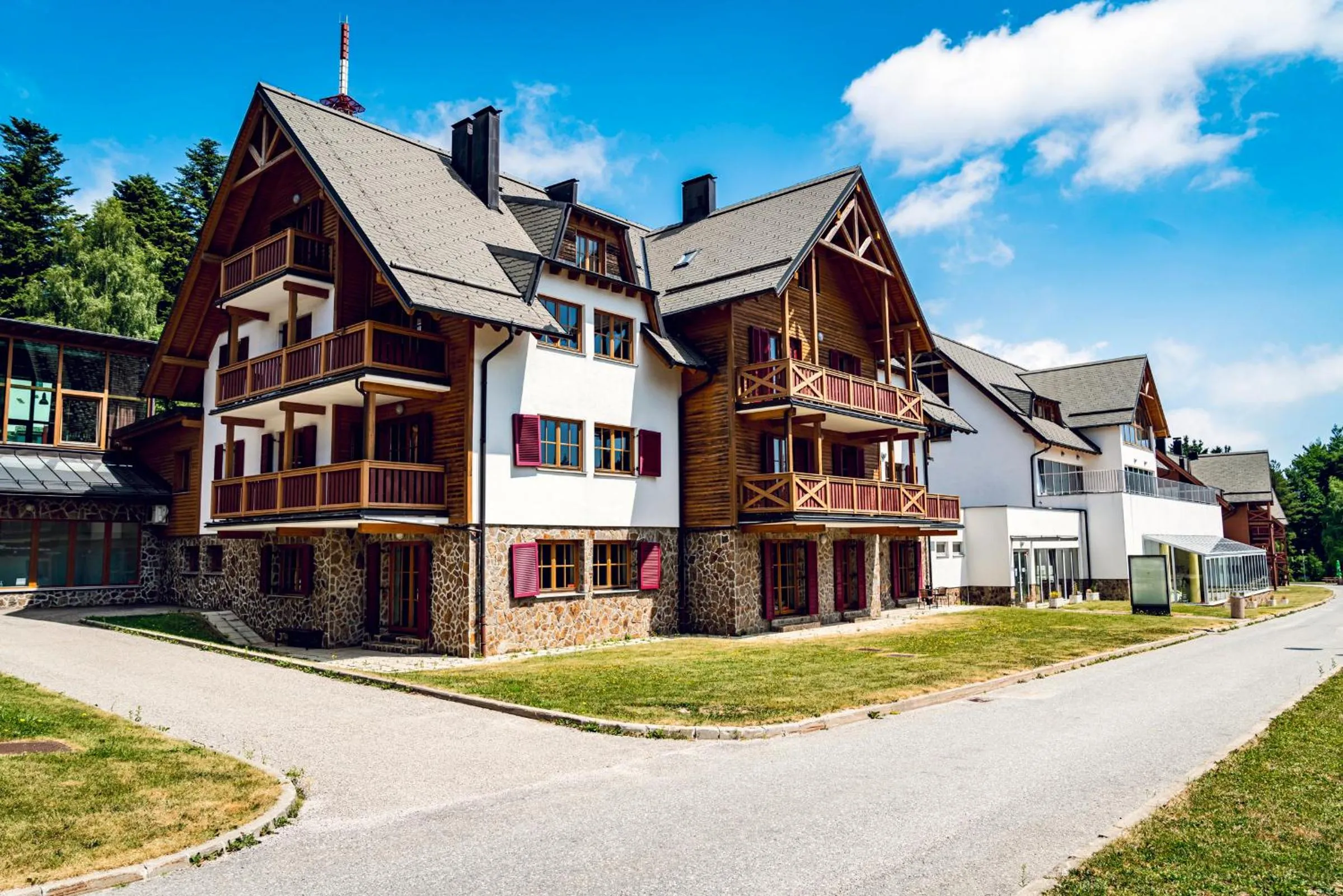 Property building in Pohorje Village Wellbeing Resort - Wellness & Spa Hotel Bolfenk