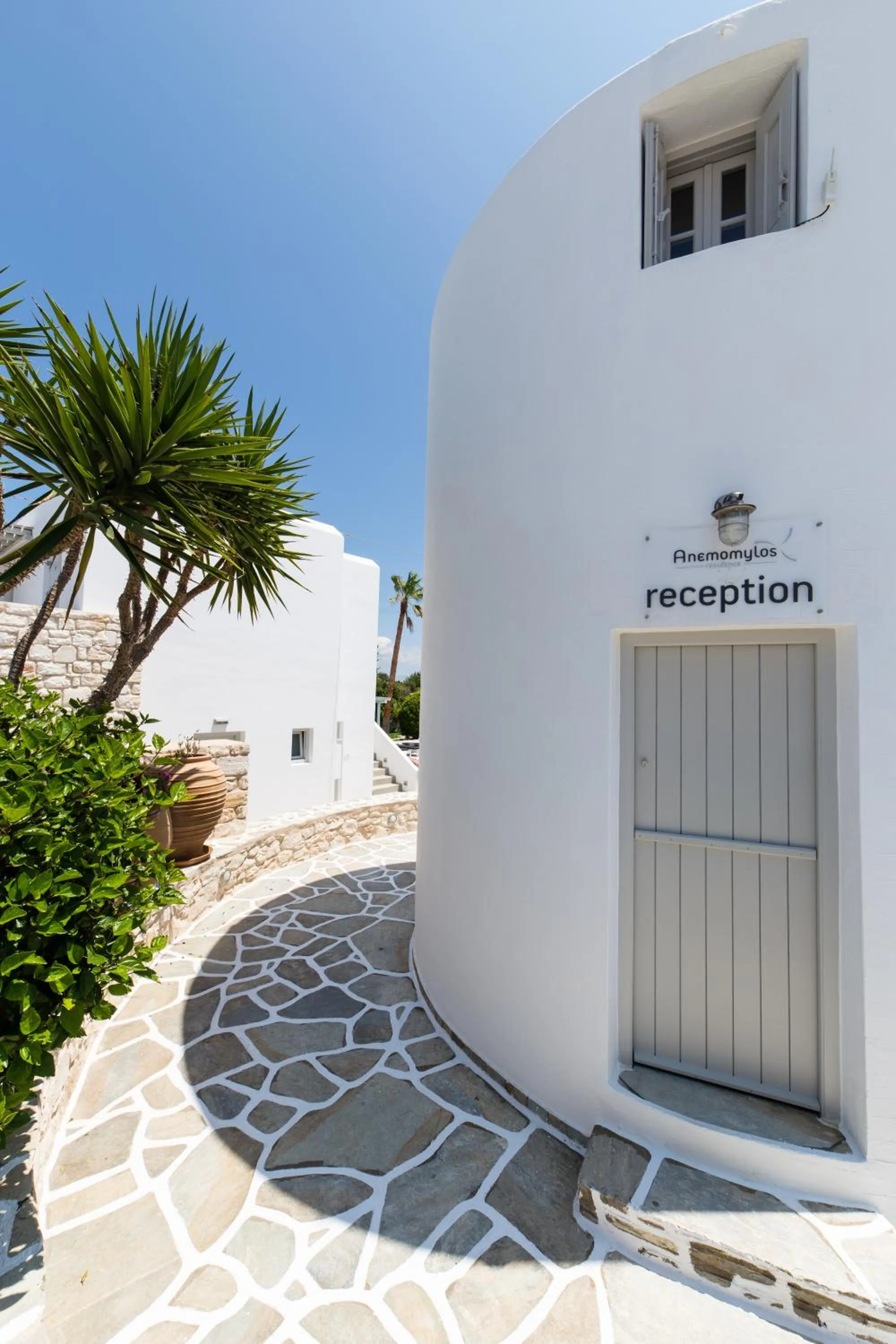 Facade/entrance in Anemomylos Residence