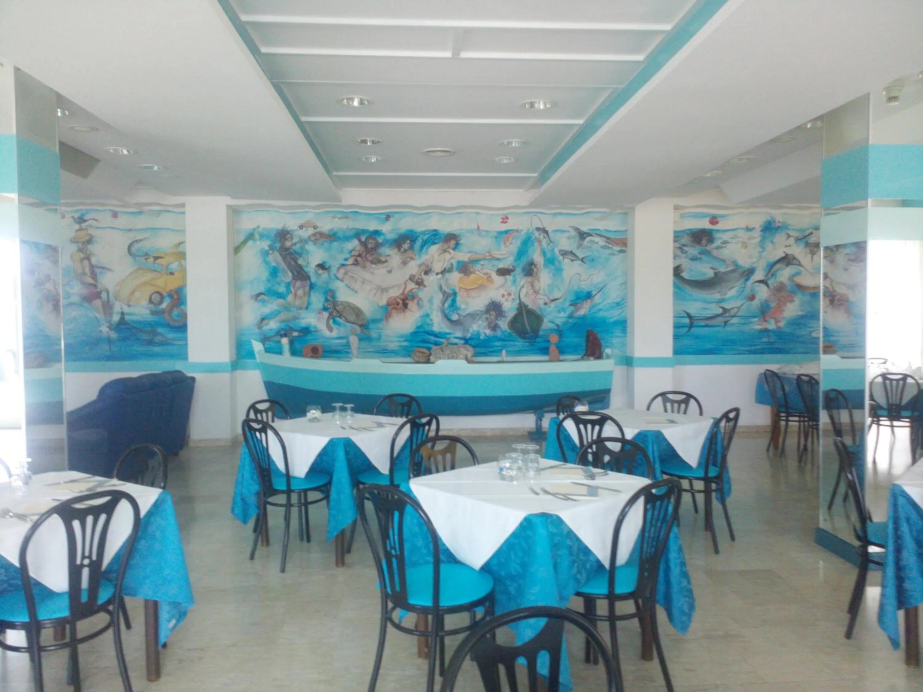 Communal lounge/ TV room in Hotel La Carruba