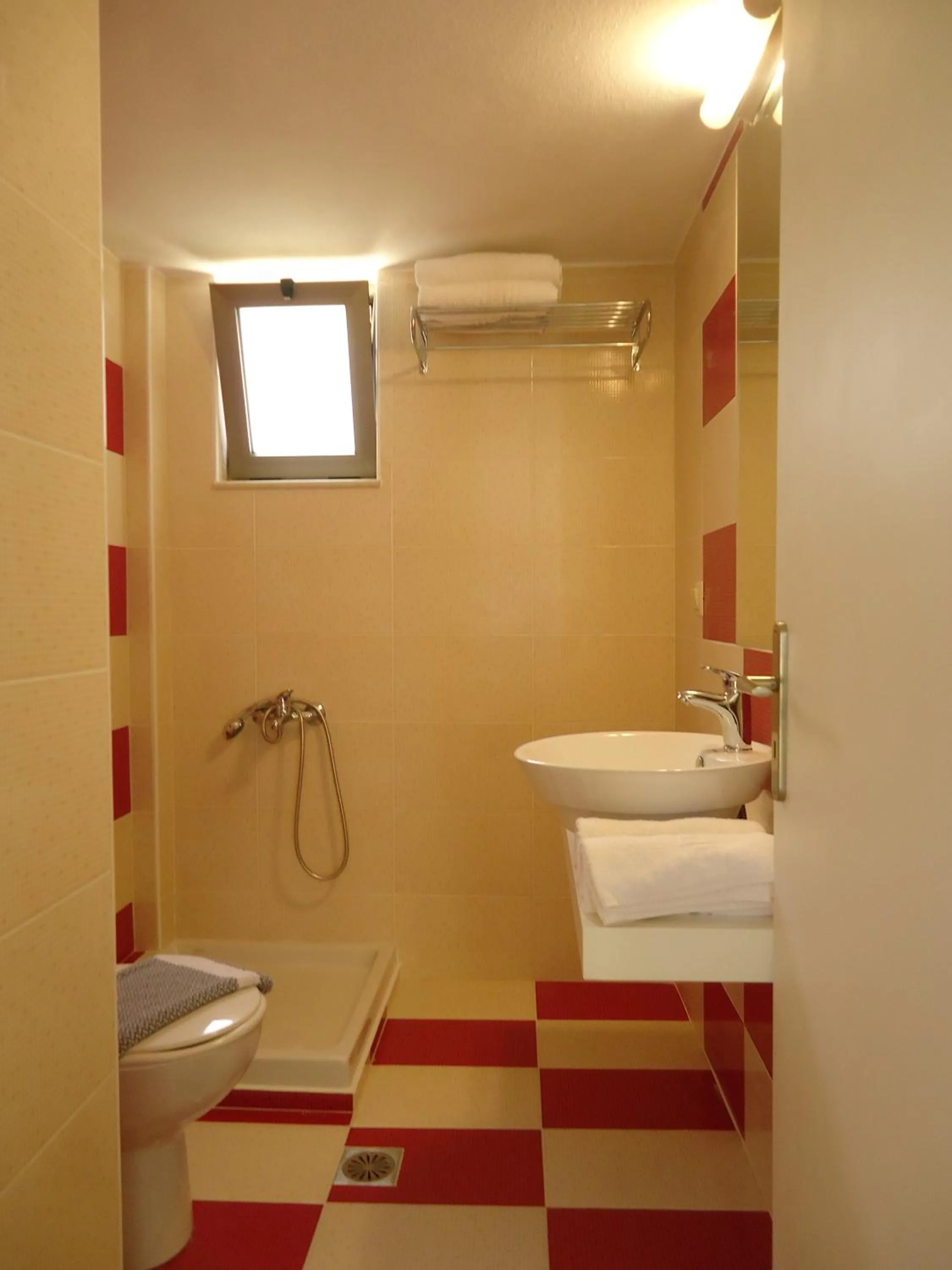 Shower in Almyra Apartments & Suites