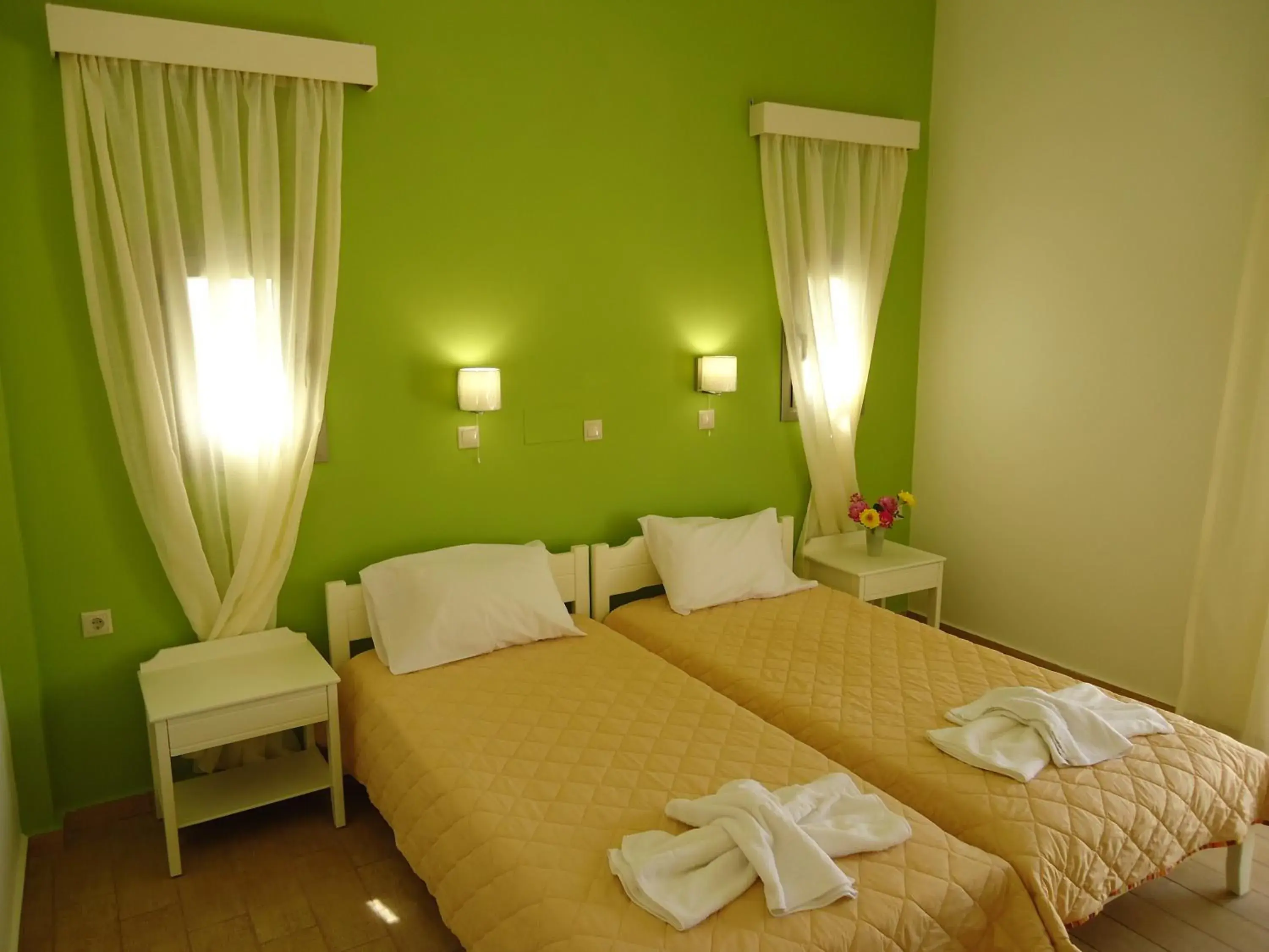 Bed in Almyra Apartments & Suites Bed in Almyra Apartments & Suites