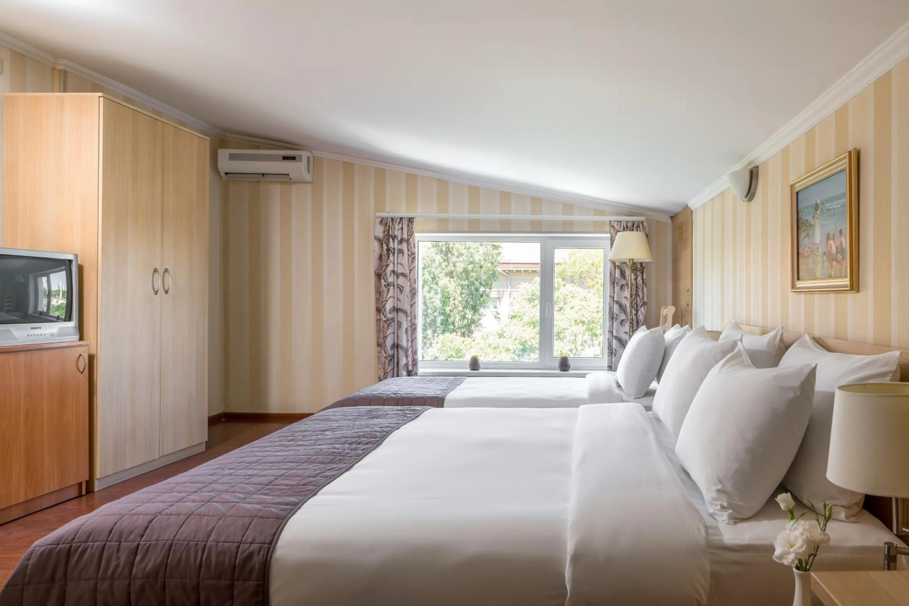 Bed in Arcadia Hotel