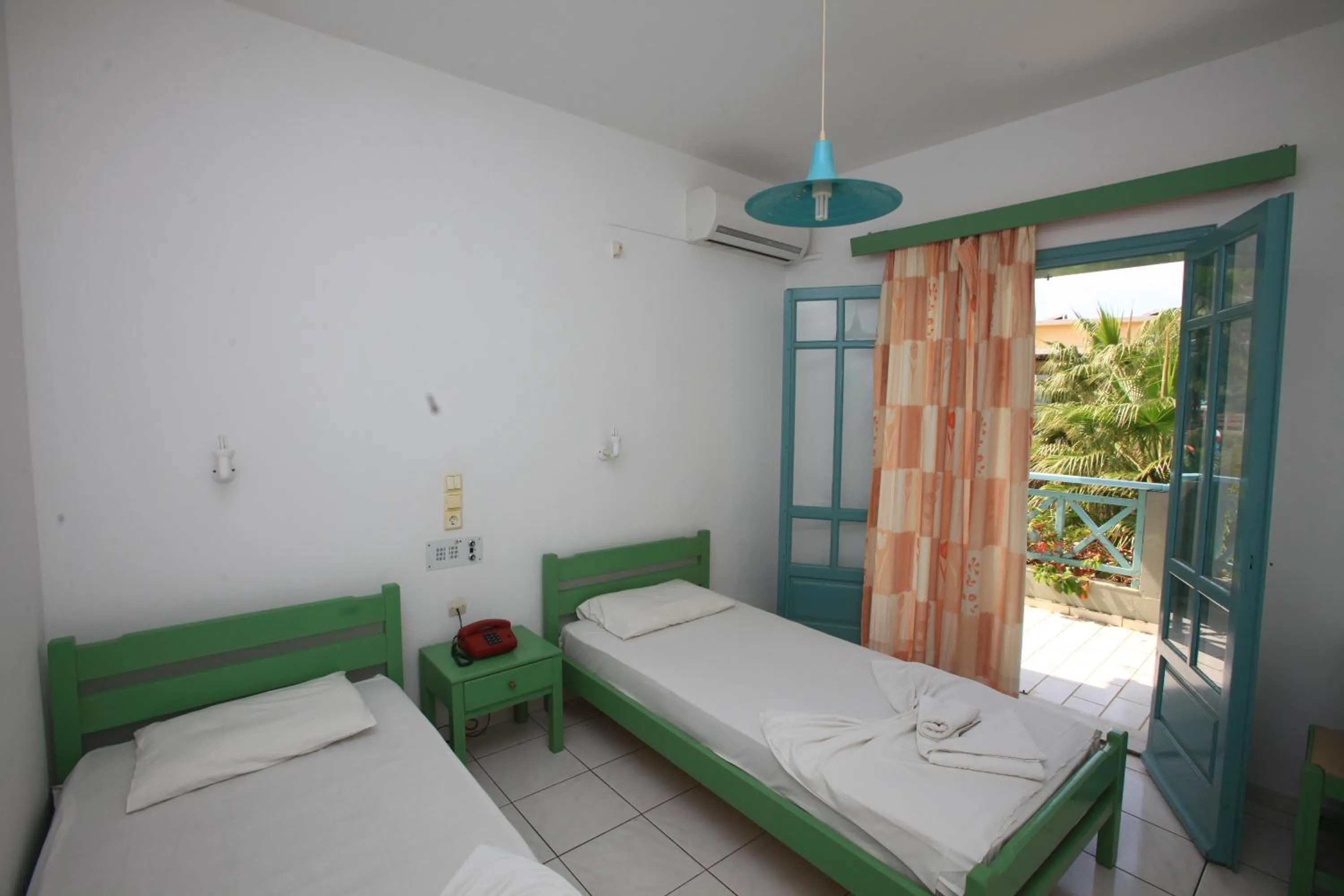 Bed in Anatoli Apartments