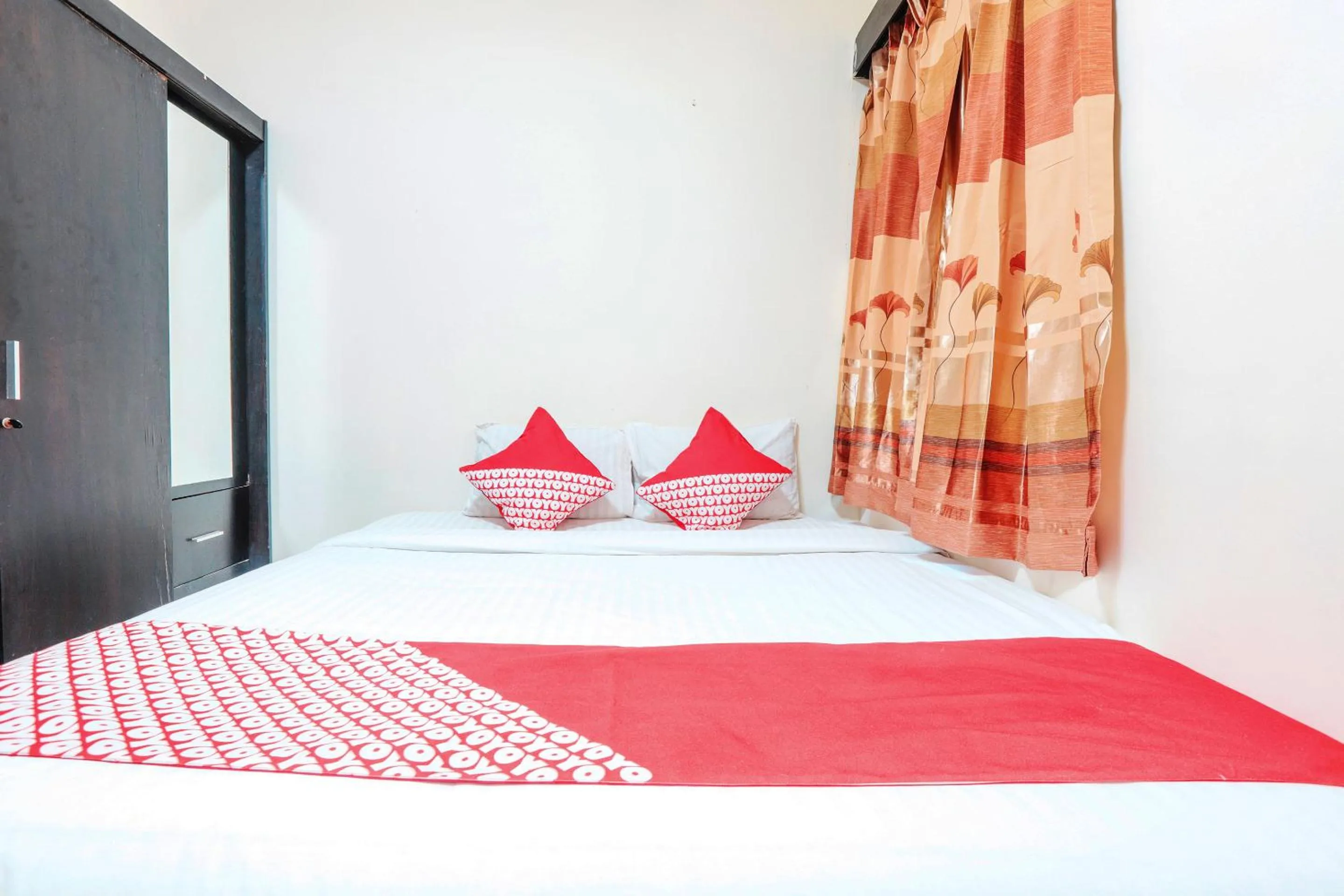 Bed in OYO 122 Oekude Kost