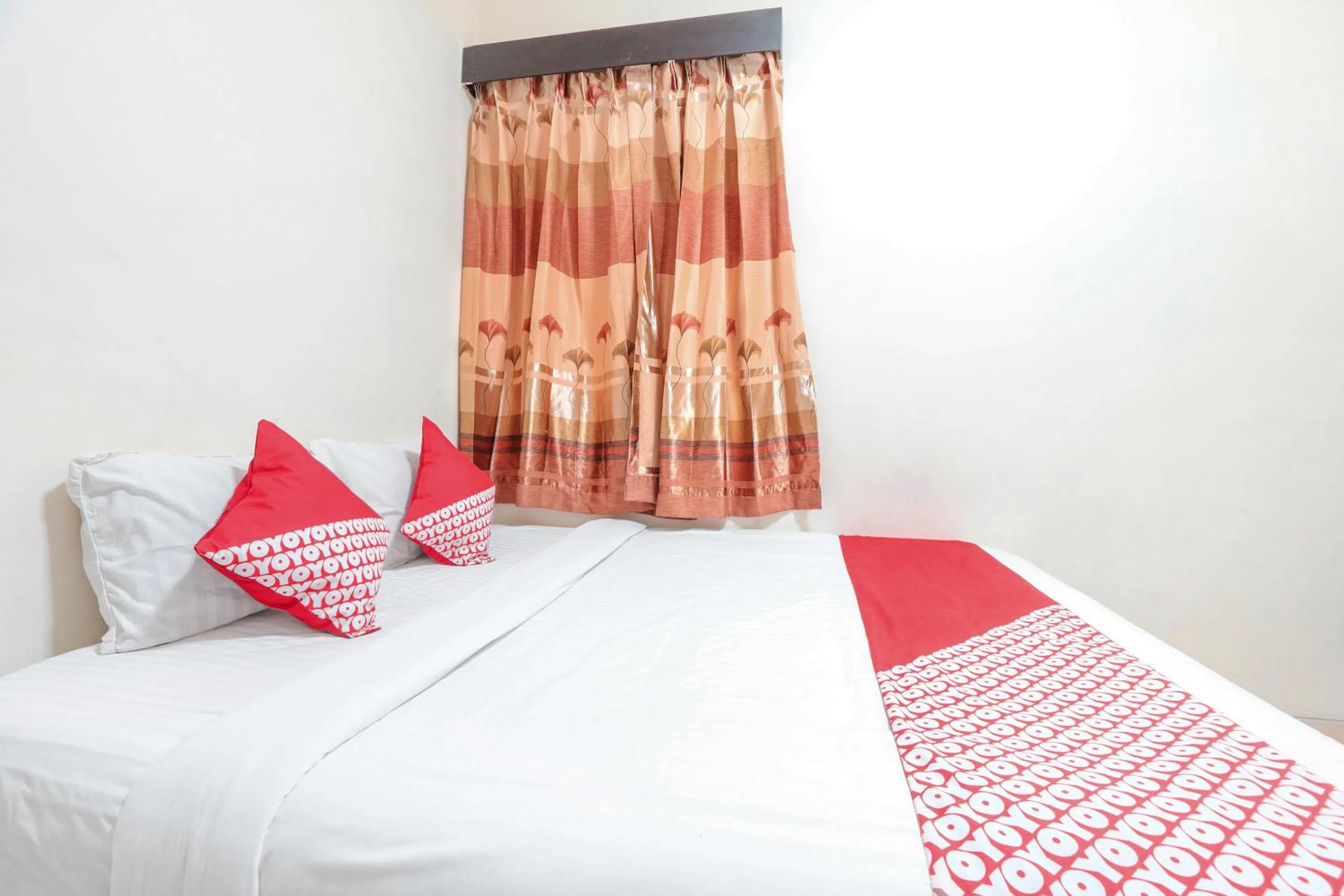 Bedroom in OYO 122 Oekude Kost