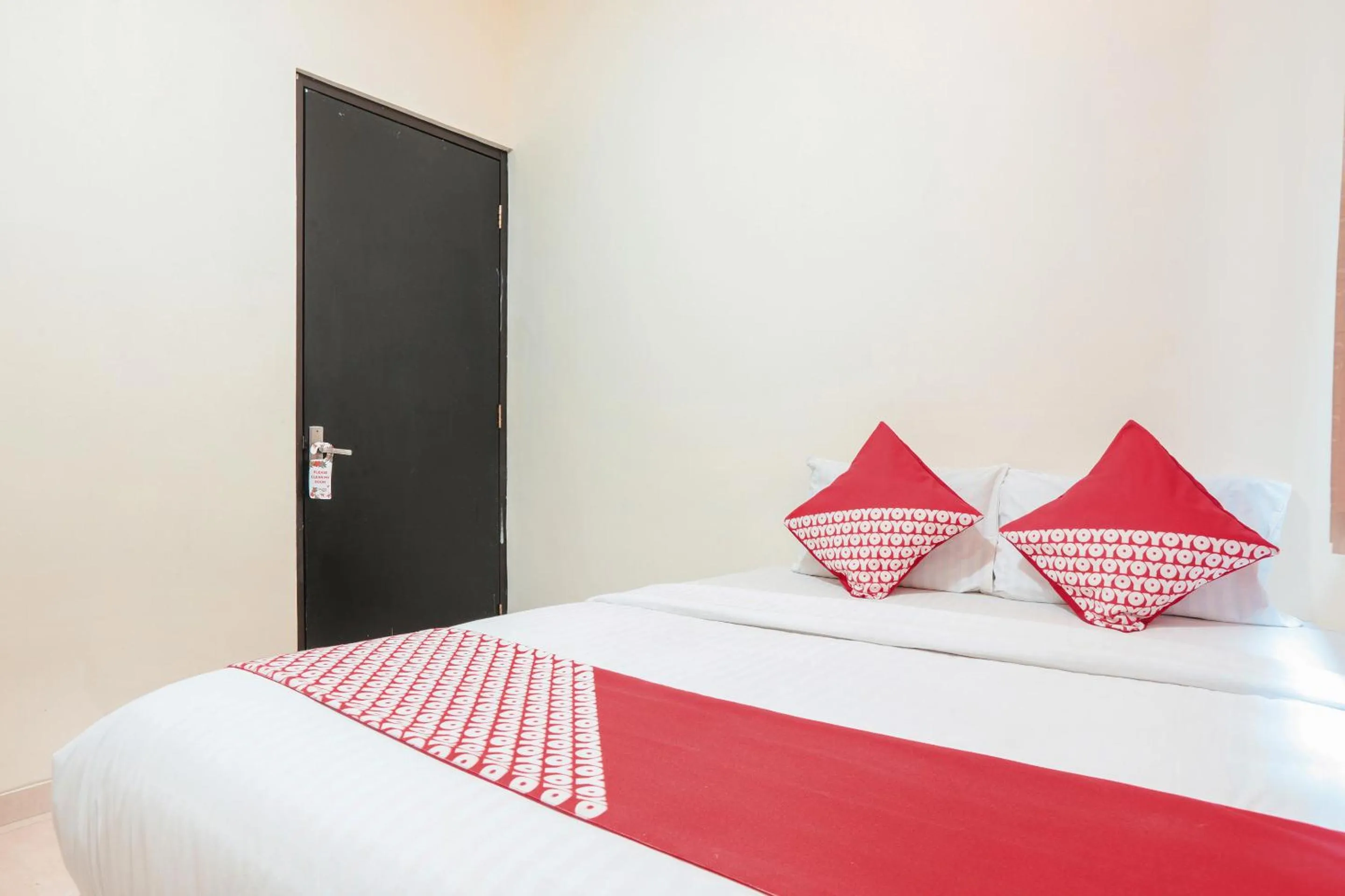 Bedroom in OYO 122 Oekude Kost