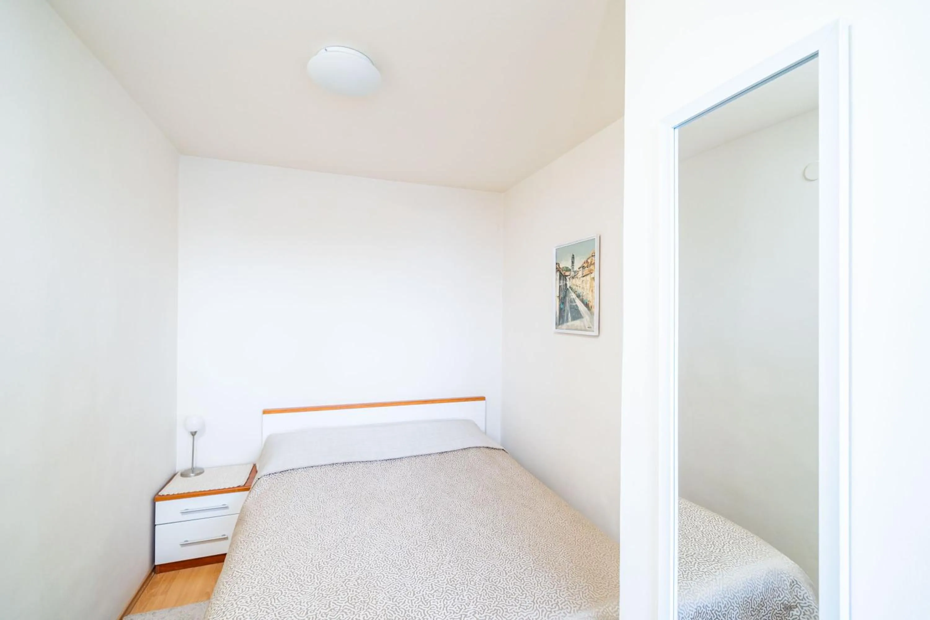 Bed in Apartment Bakus
