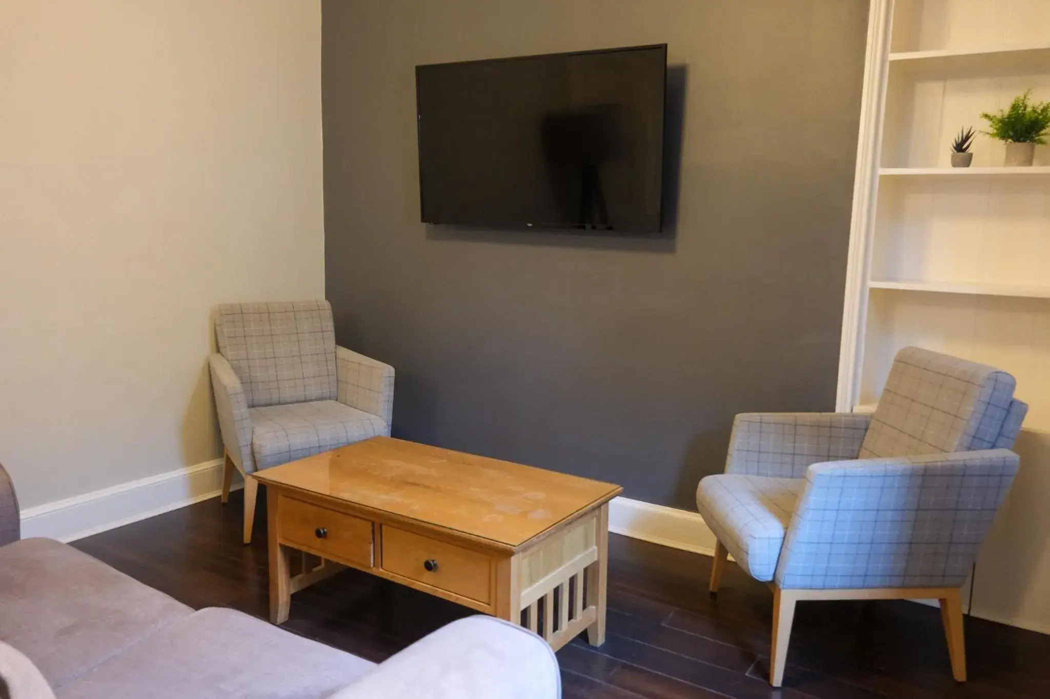 Living room in The Glen Mhor Apartments Living room in The Glen Mhor Apartments