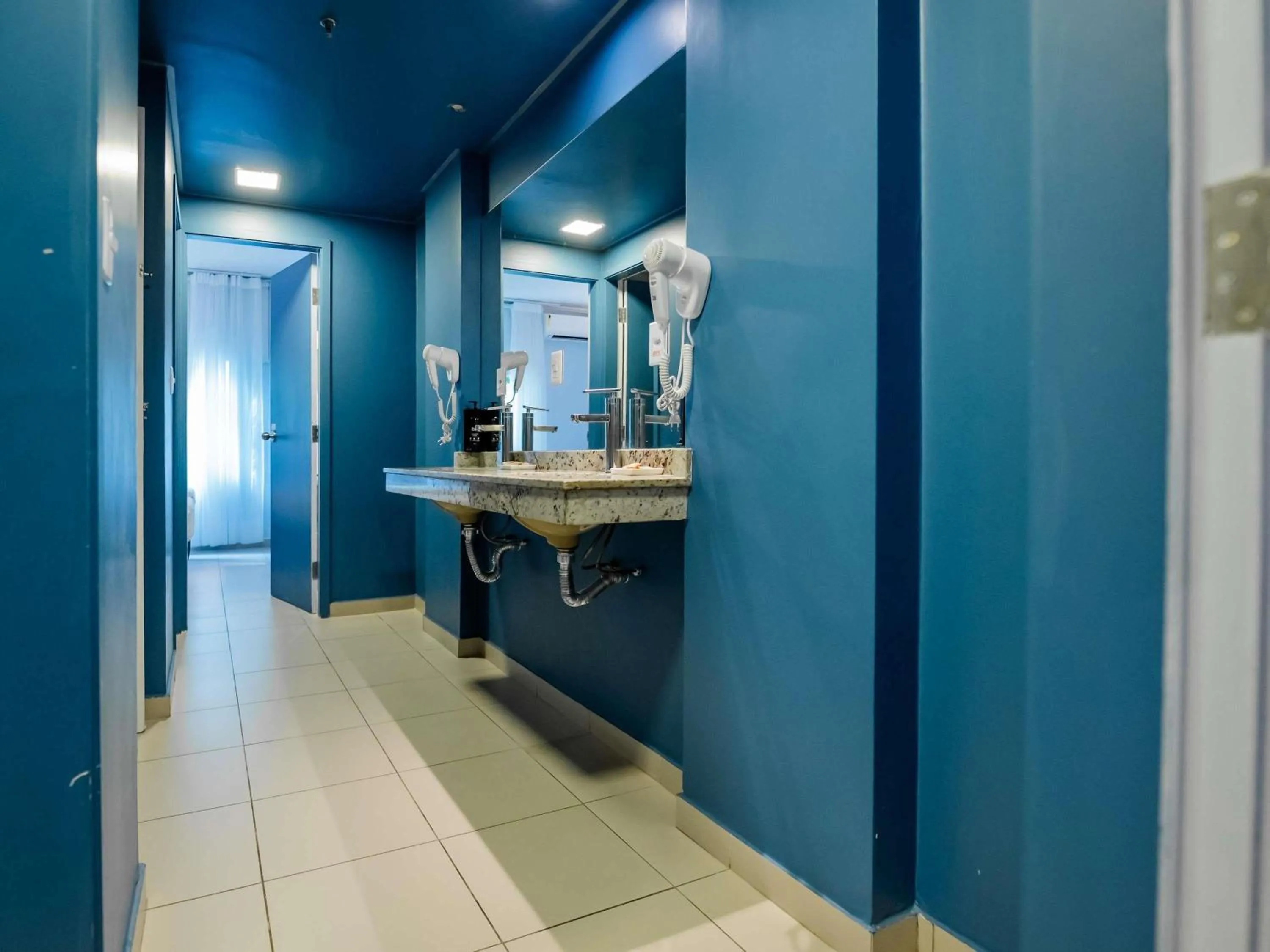 Bedroom in ibis Styles Manaus