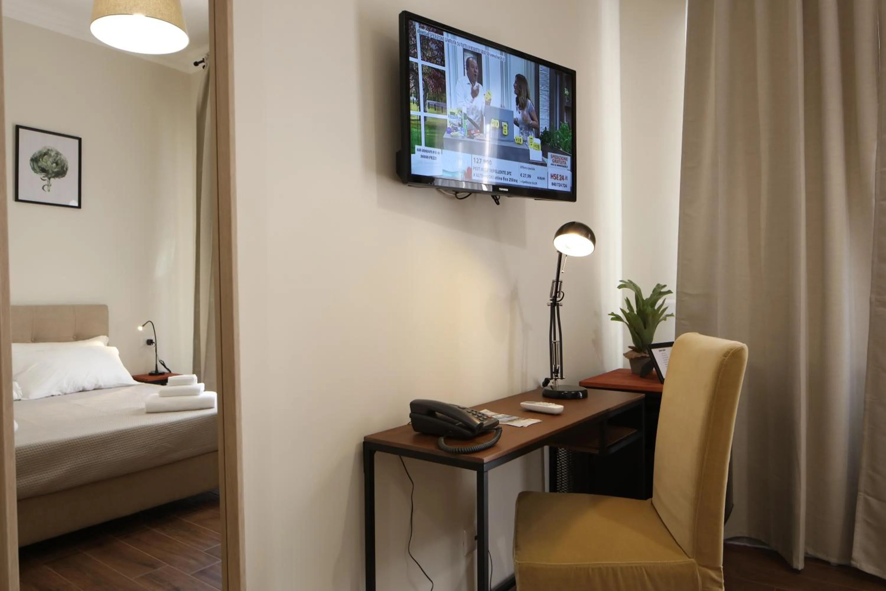 Bed in Khome Rooms & Apartment