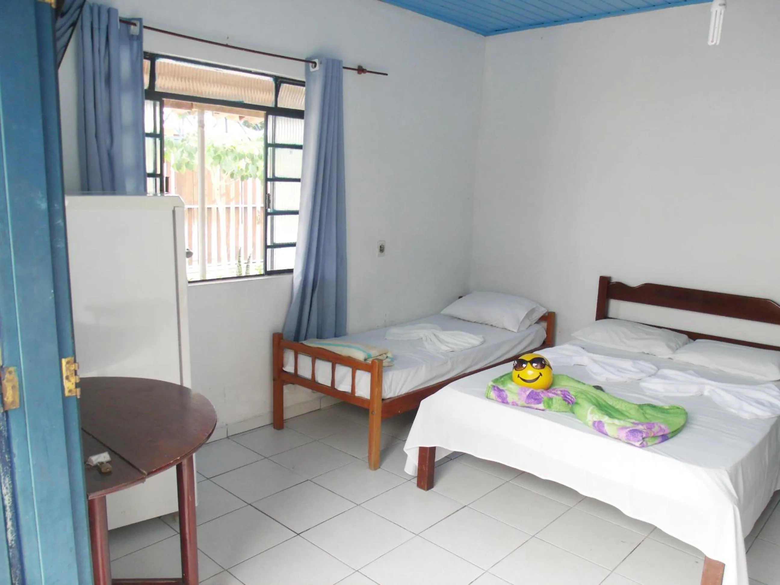 Bed in Pousada Edson