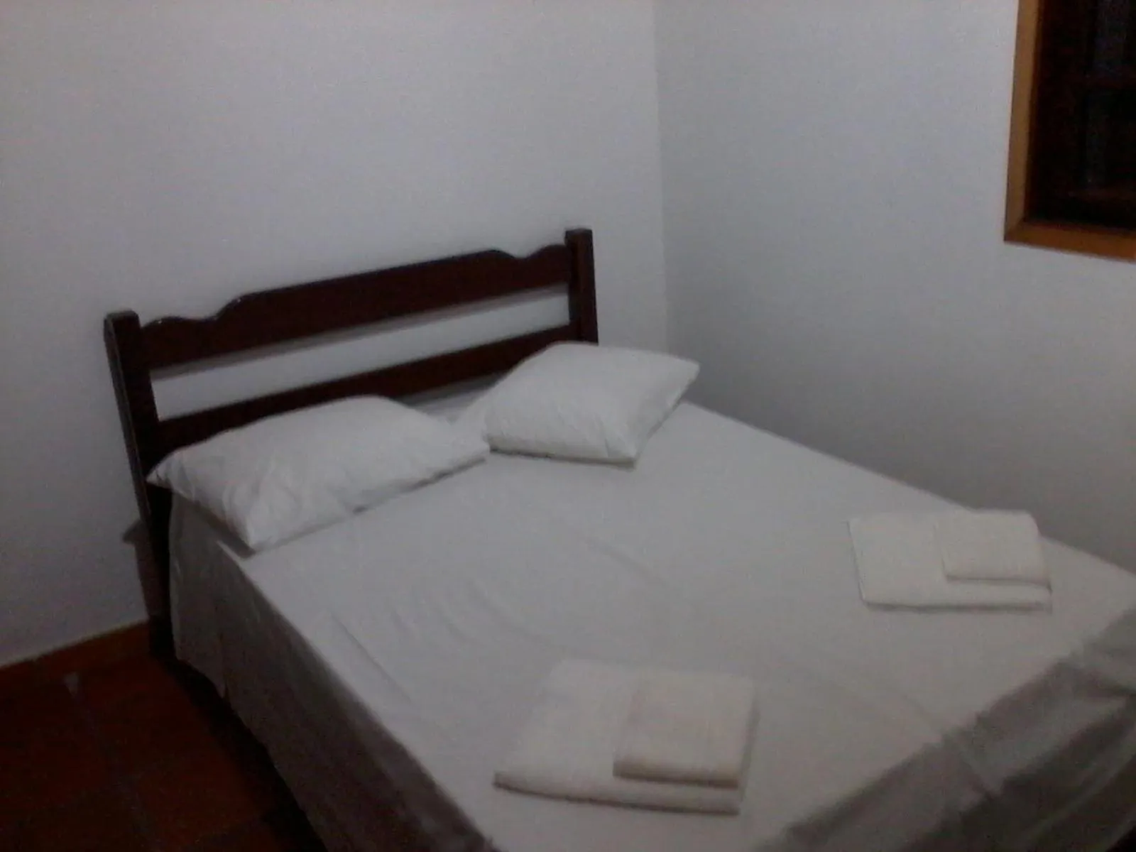 Bed in Pousada Edson
