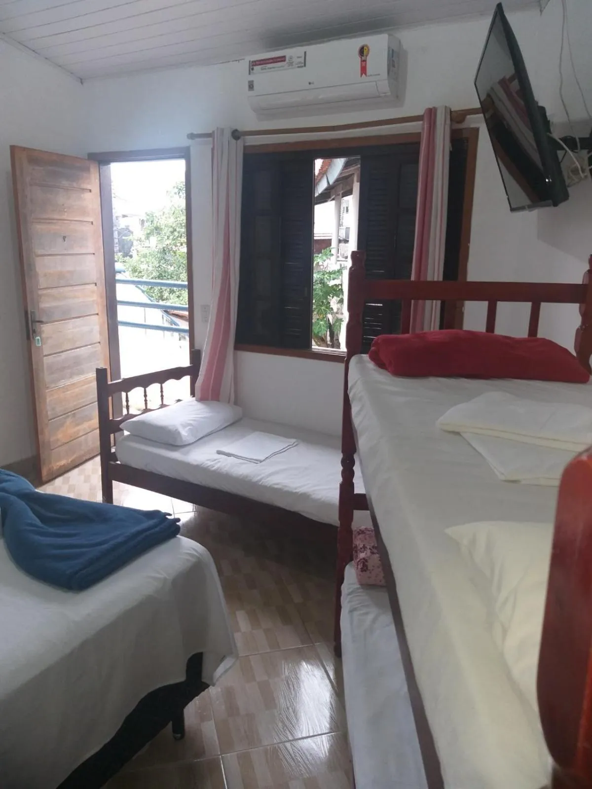 Bed in Pousada Edson