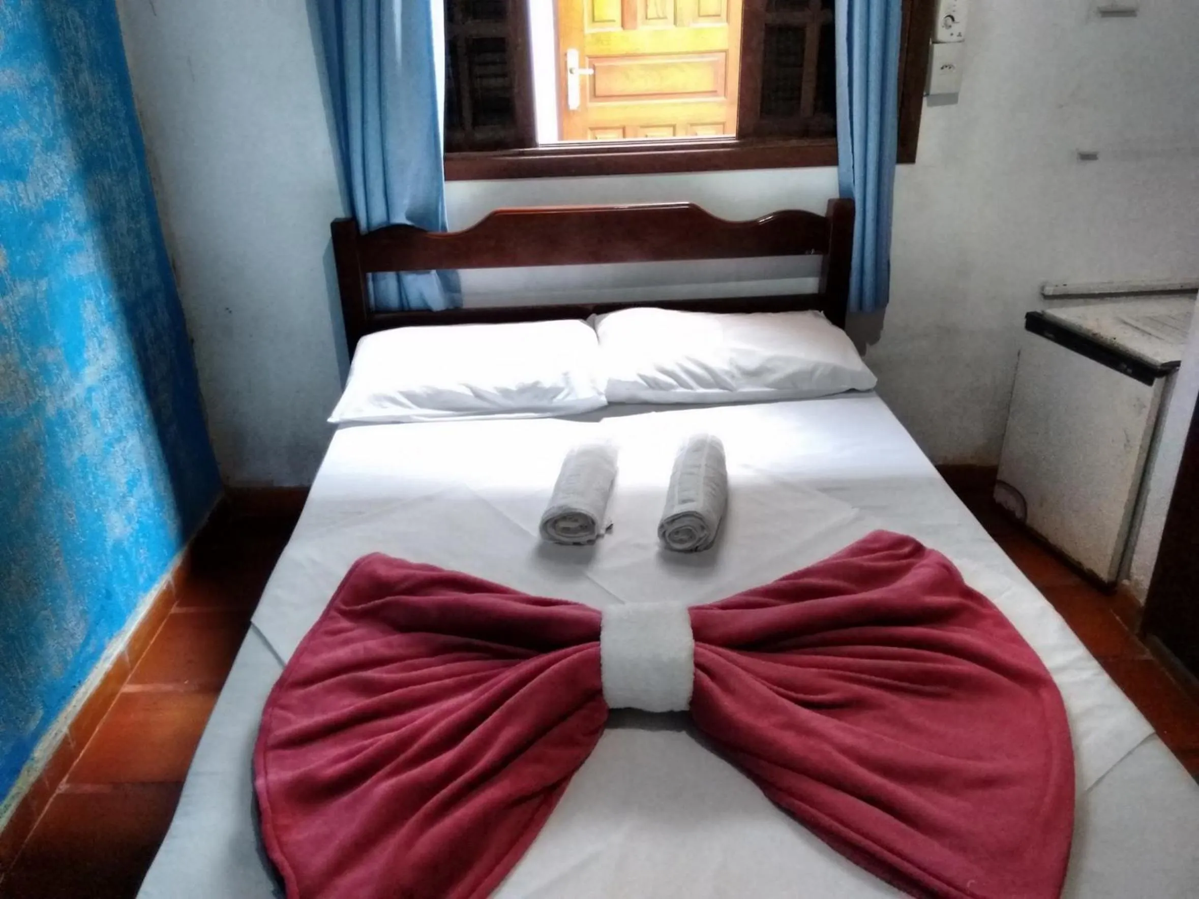 Bed in Pousada Edson