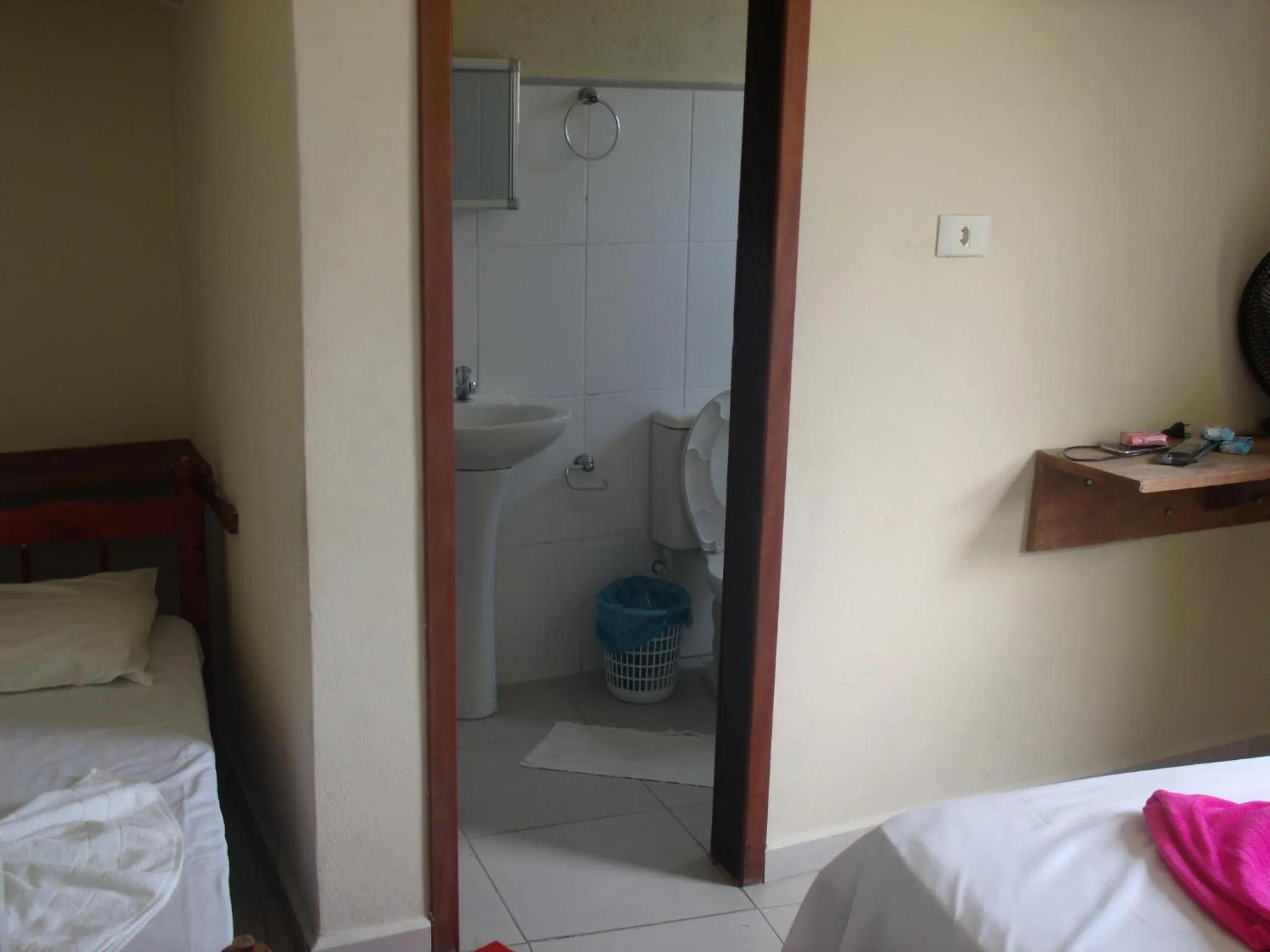 Bed in Pousada Edson