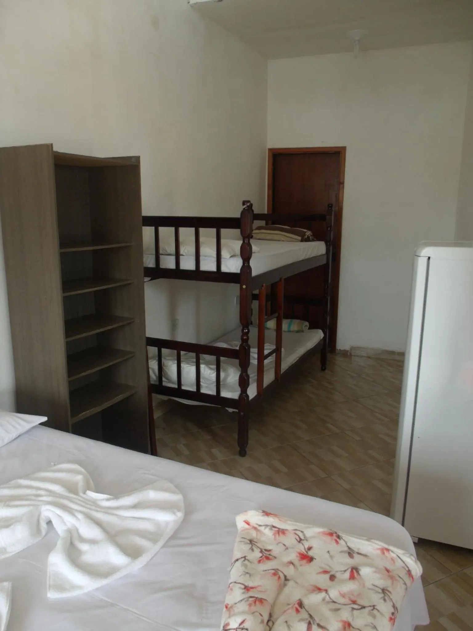 Bed in Pousada Edson