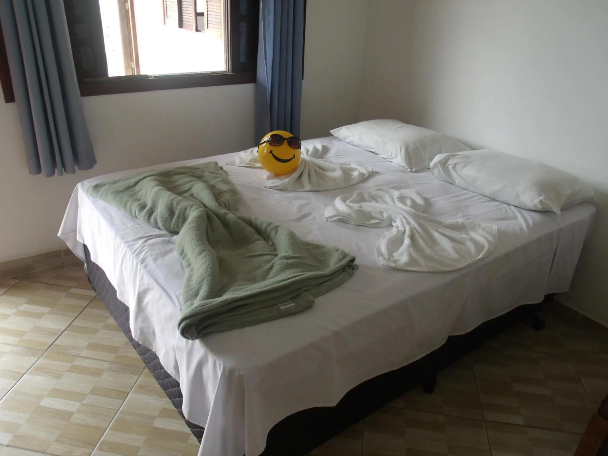 Bed in Pousada Edson