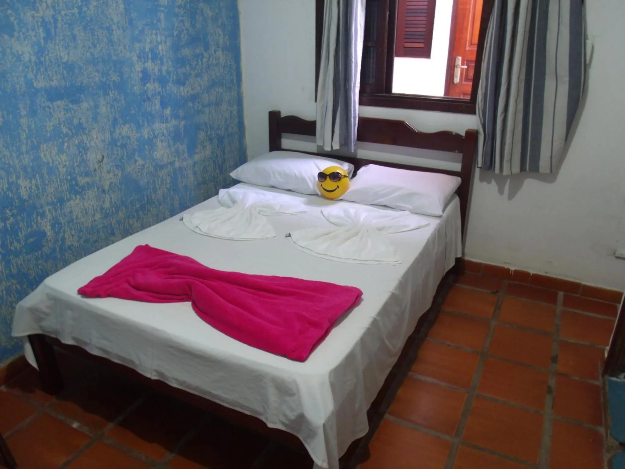 Bed in Pousada Edson