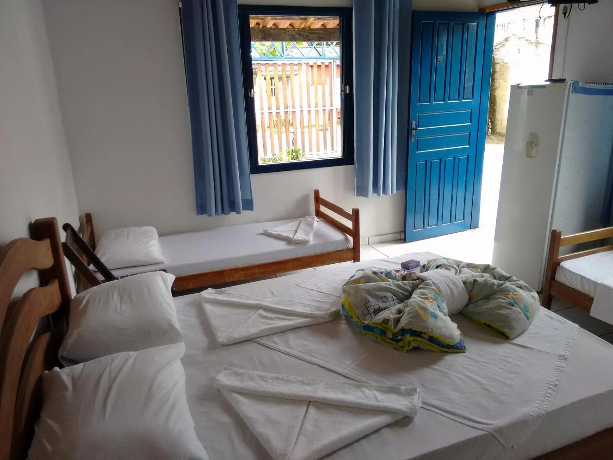 Bed in Pousada Edson