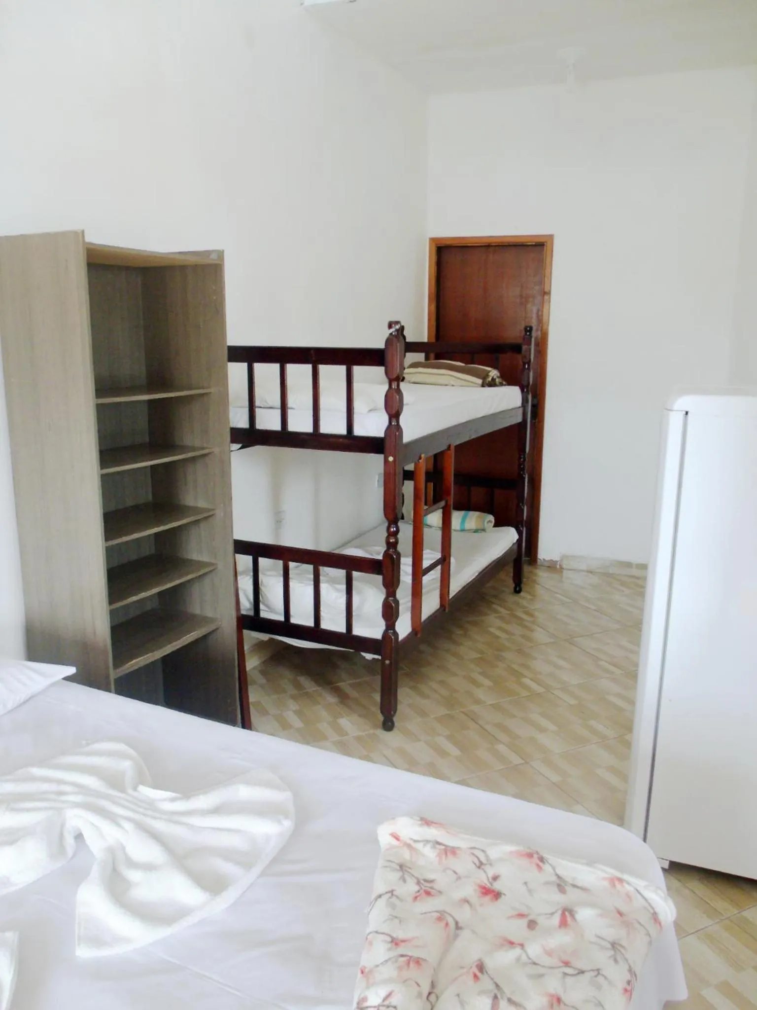 Bed in Pousada Edson