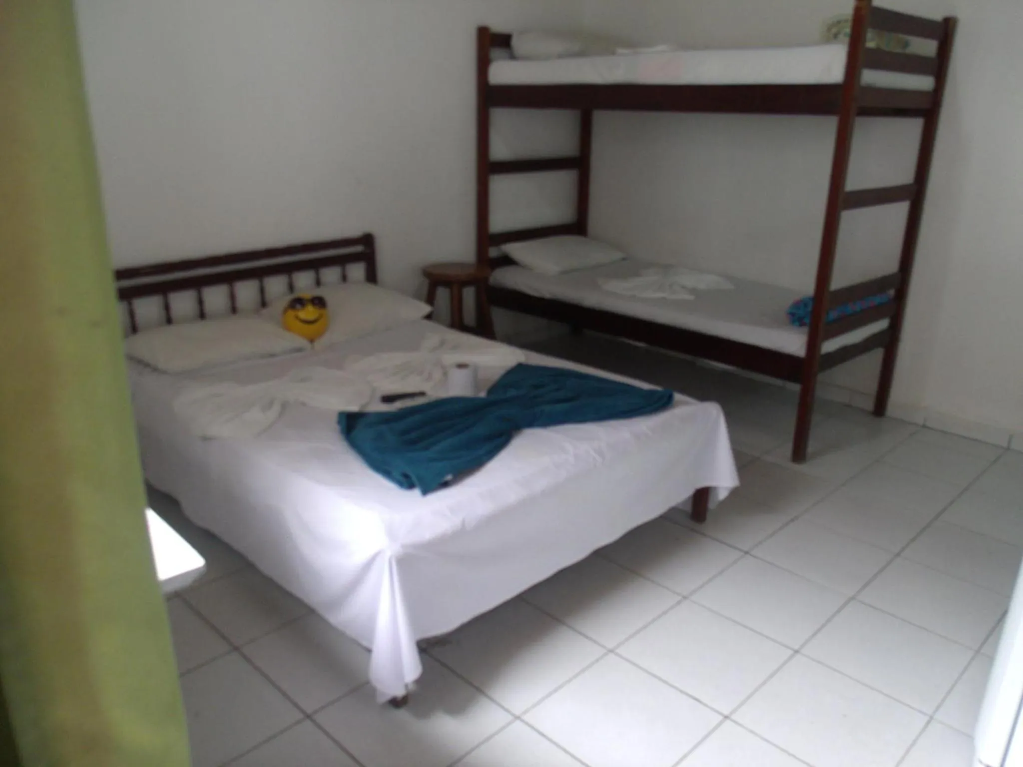 Bed in Pousada Edson