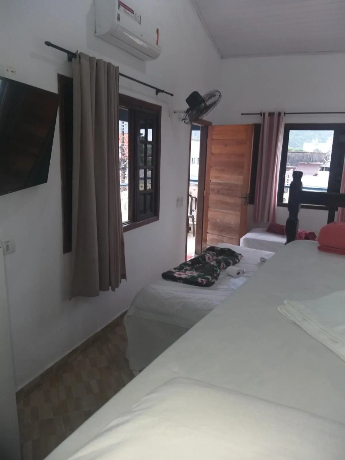 Bed in Pousada Edson