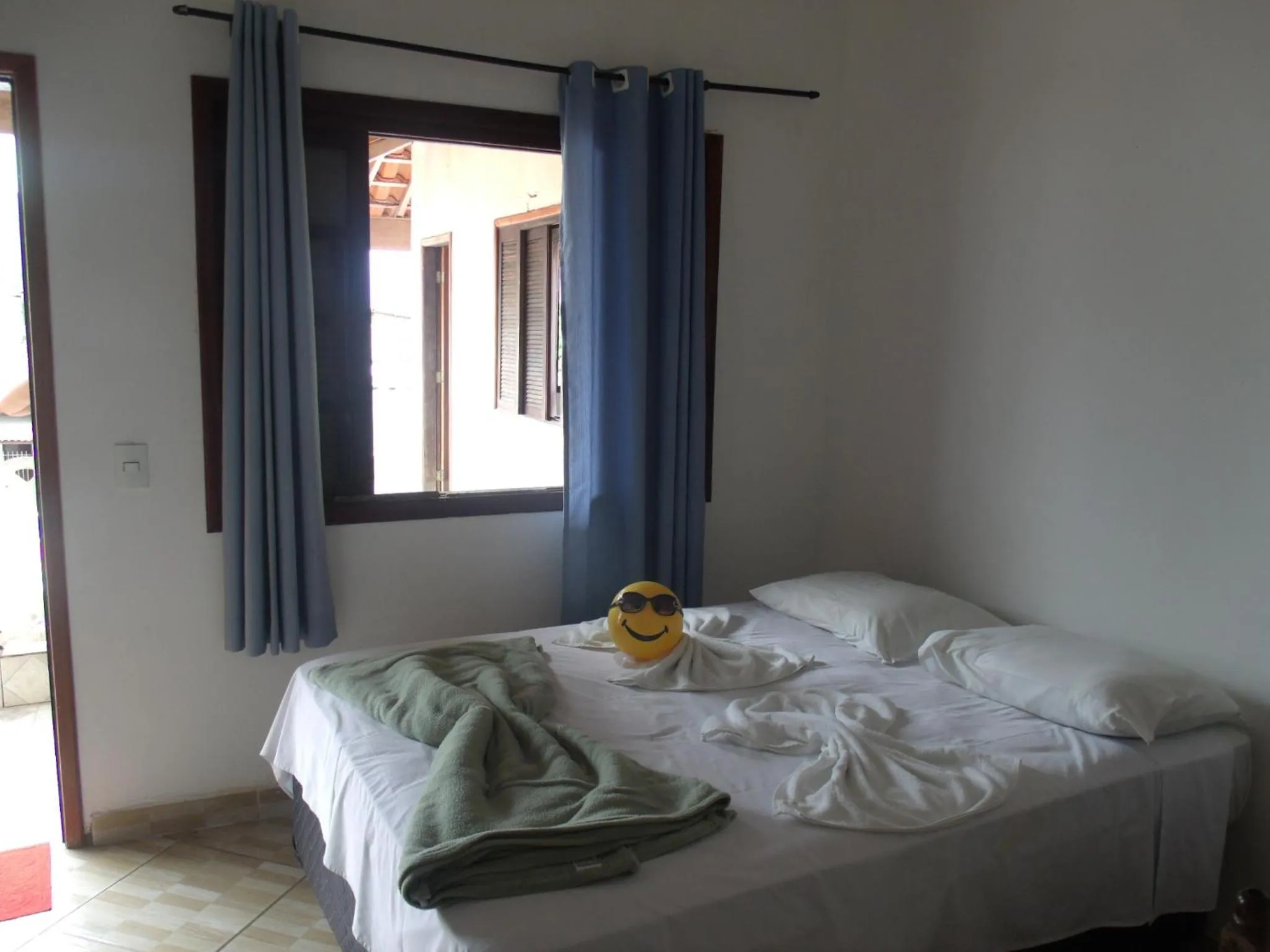 Bed in Pousada Edson