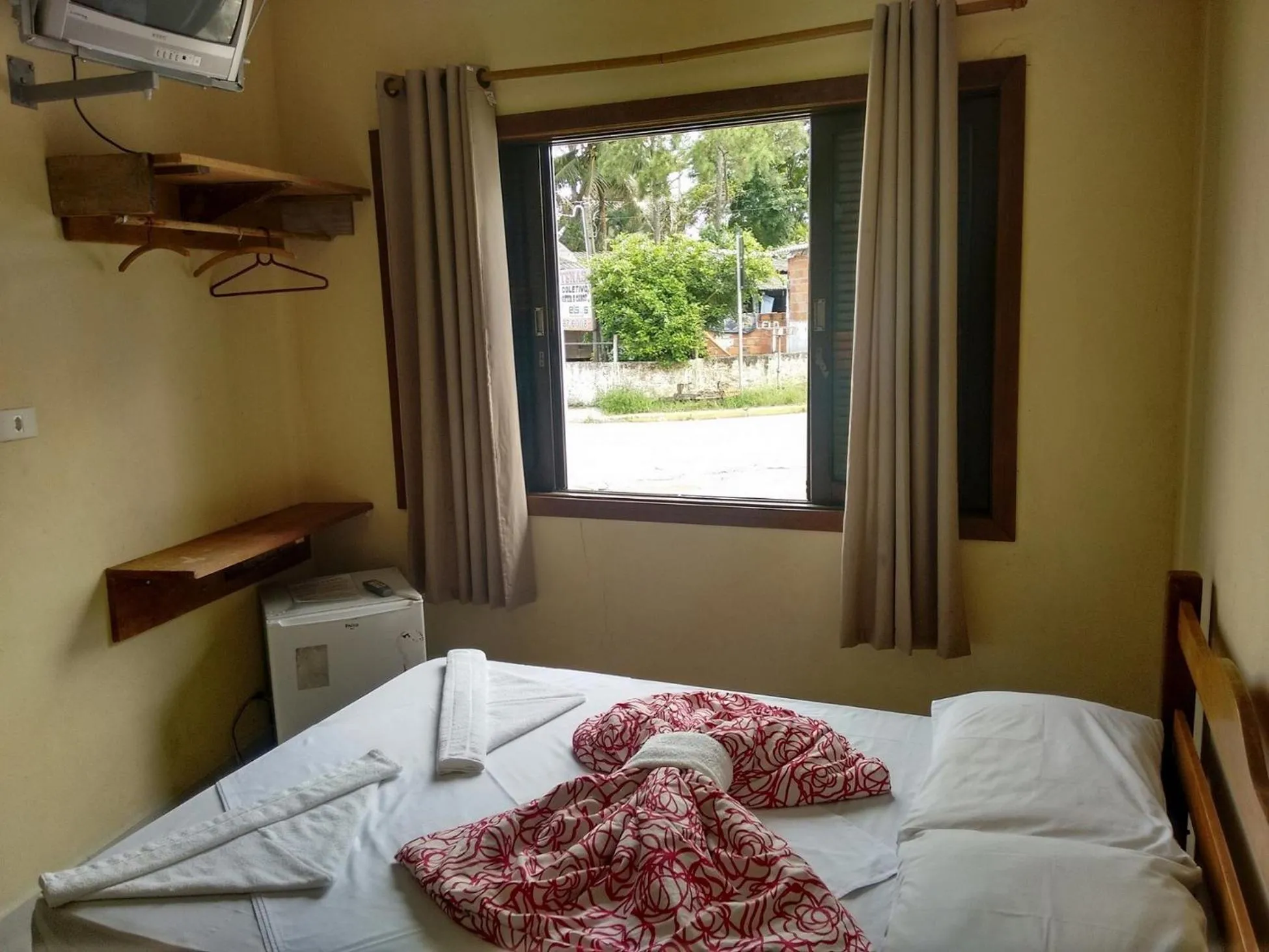 Bed in Pousada Edson