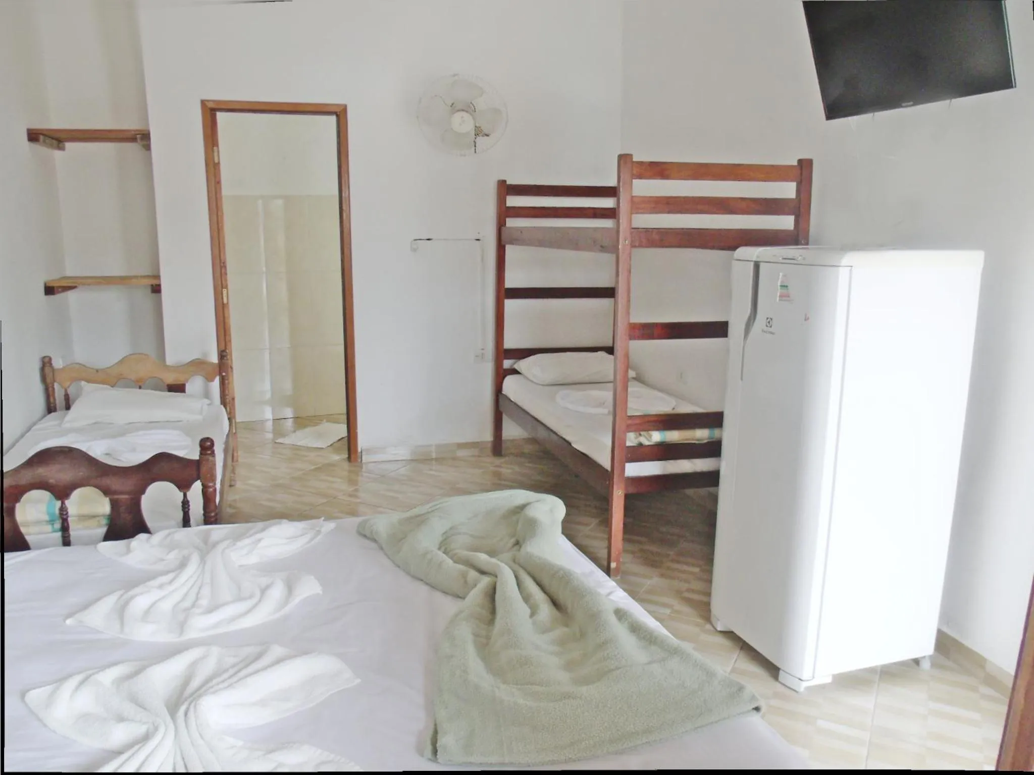 Bed in Pousada Edson