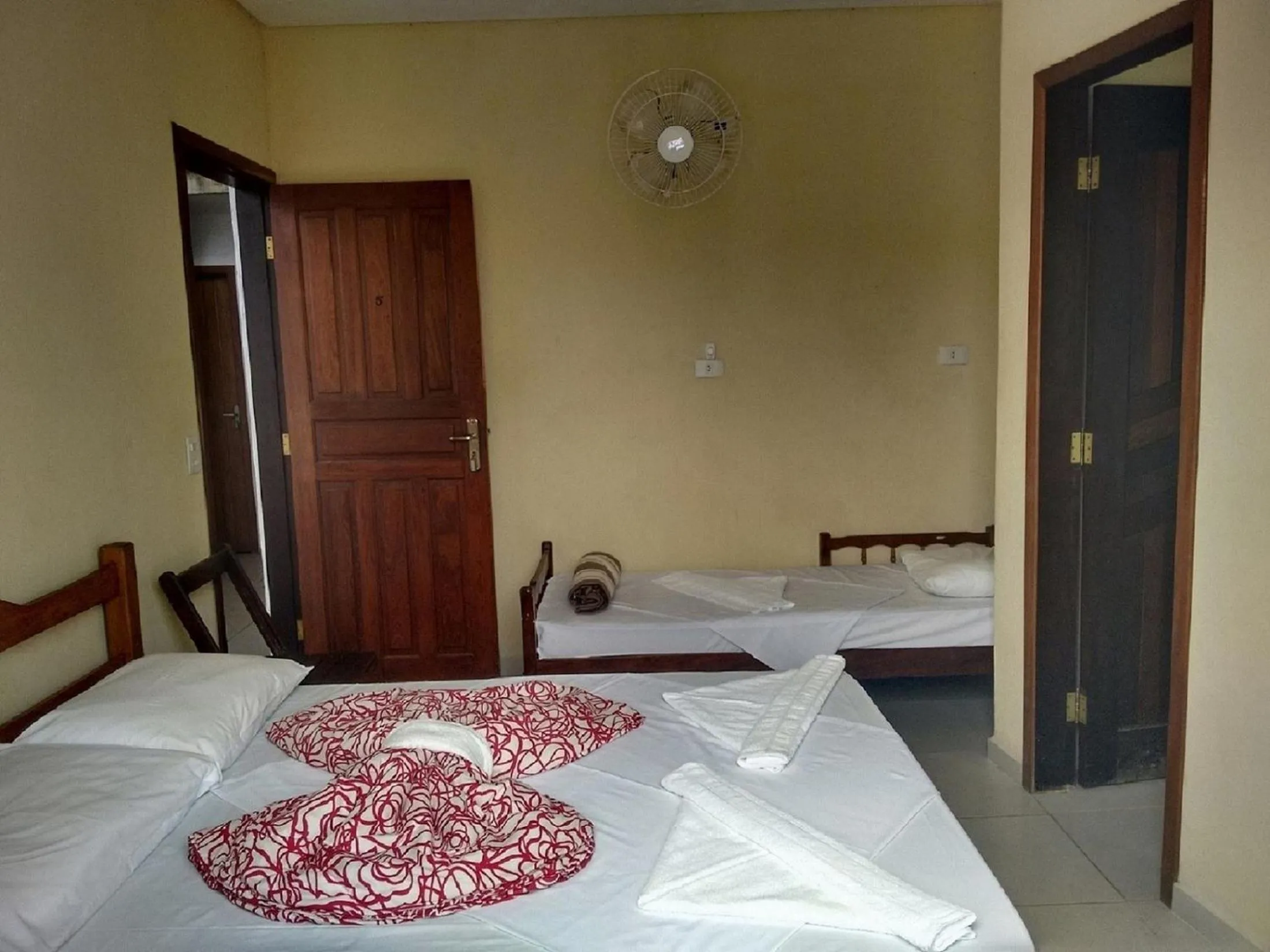 Bed in Pousada Edson