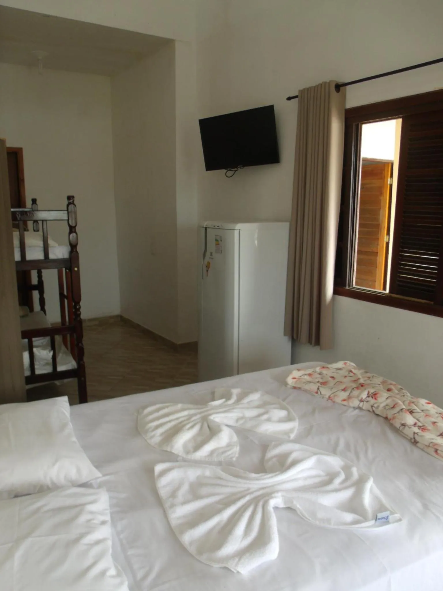 Bed in Pousada Edson