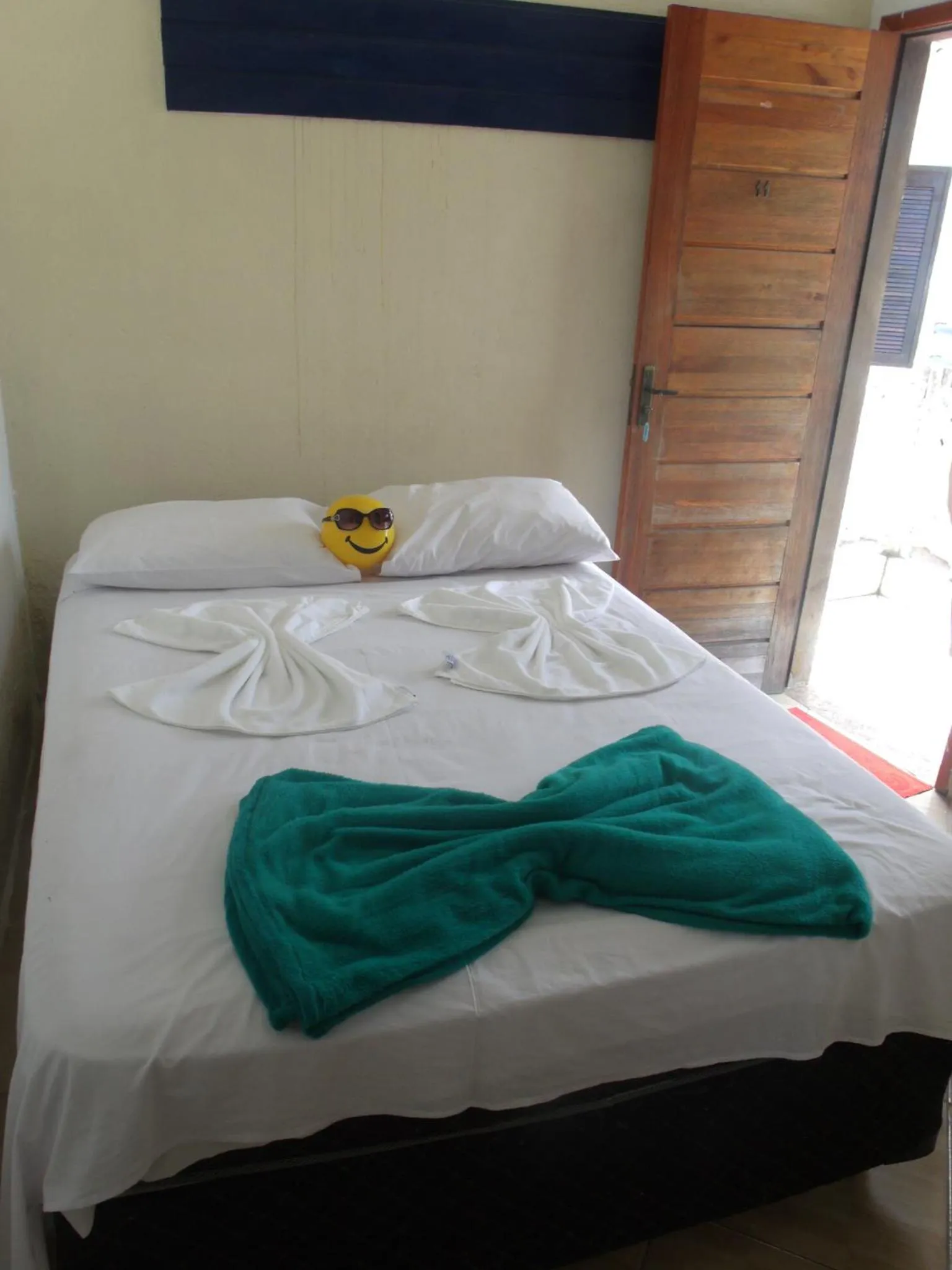 Bed in Pousada Edson