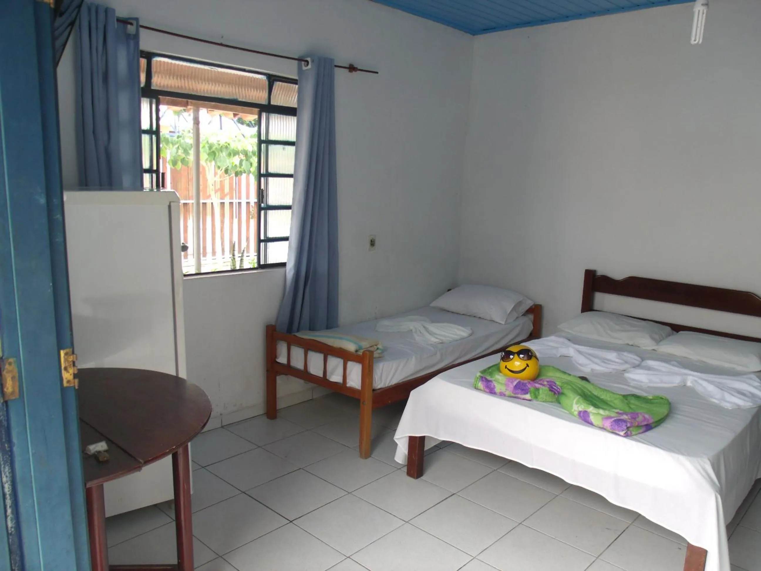 Bed in Pousada Edson