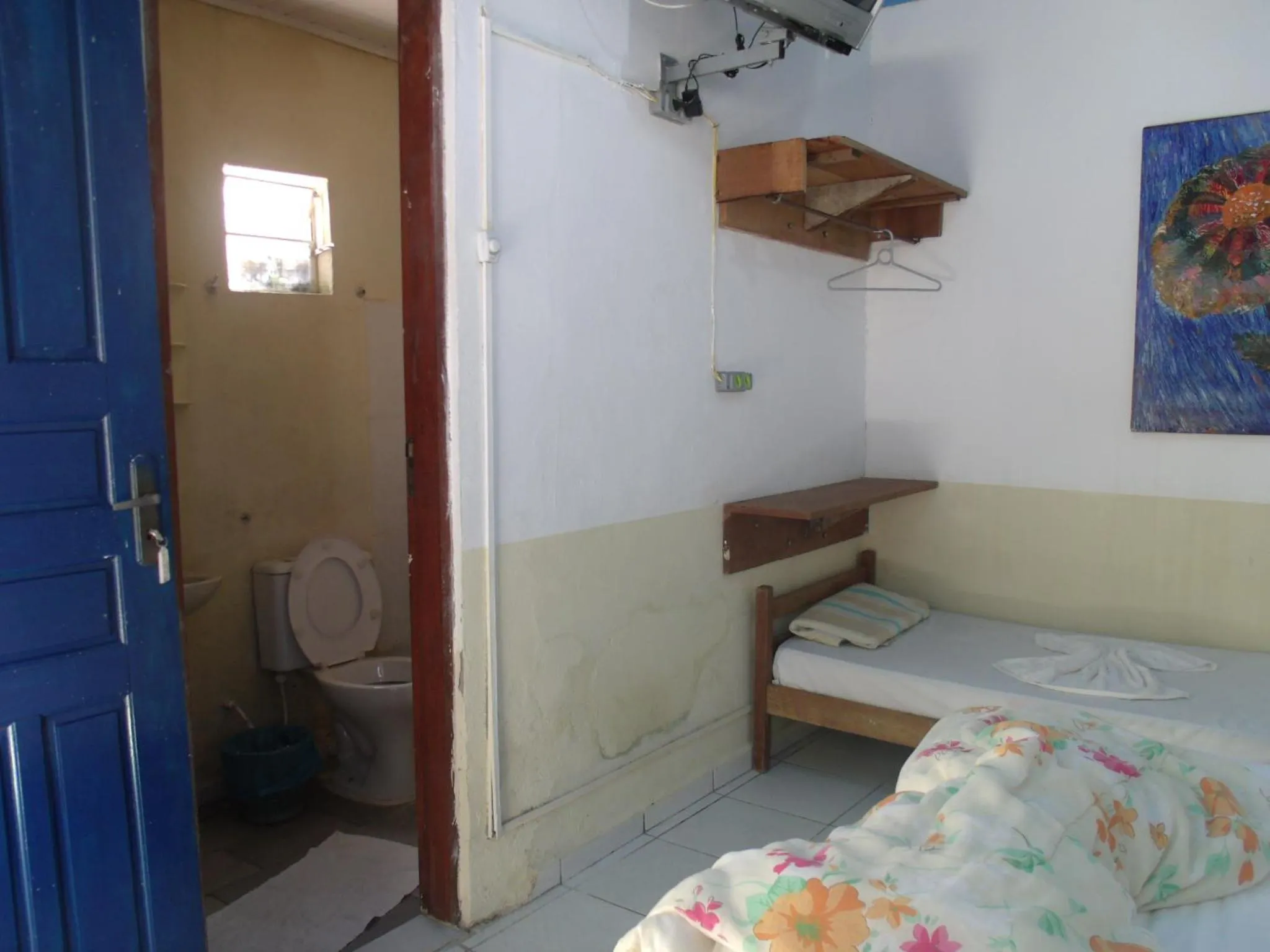 Bed in Pousada Edson