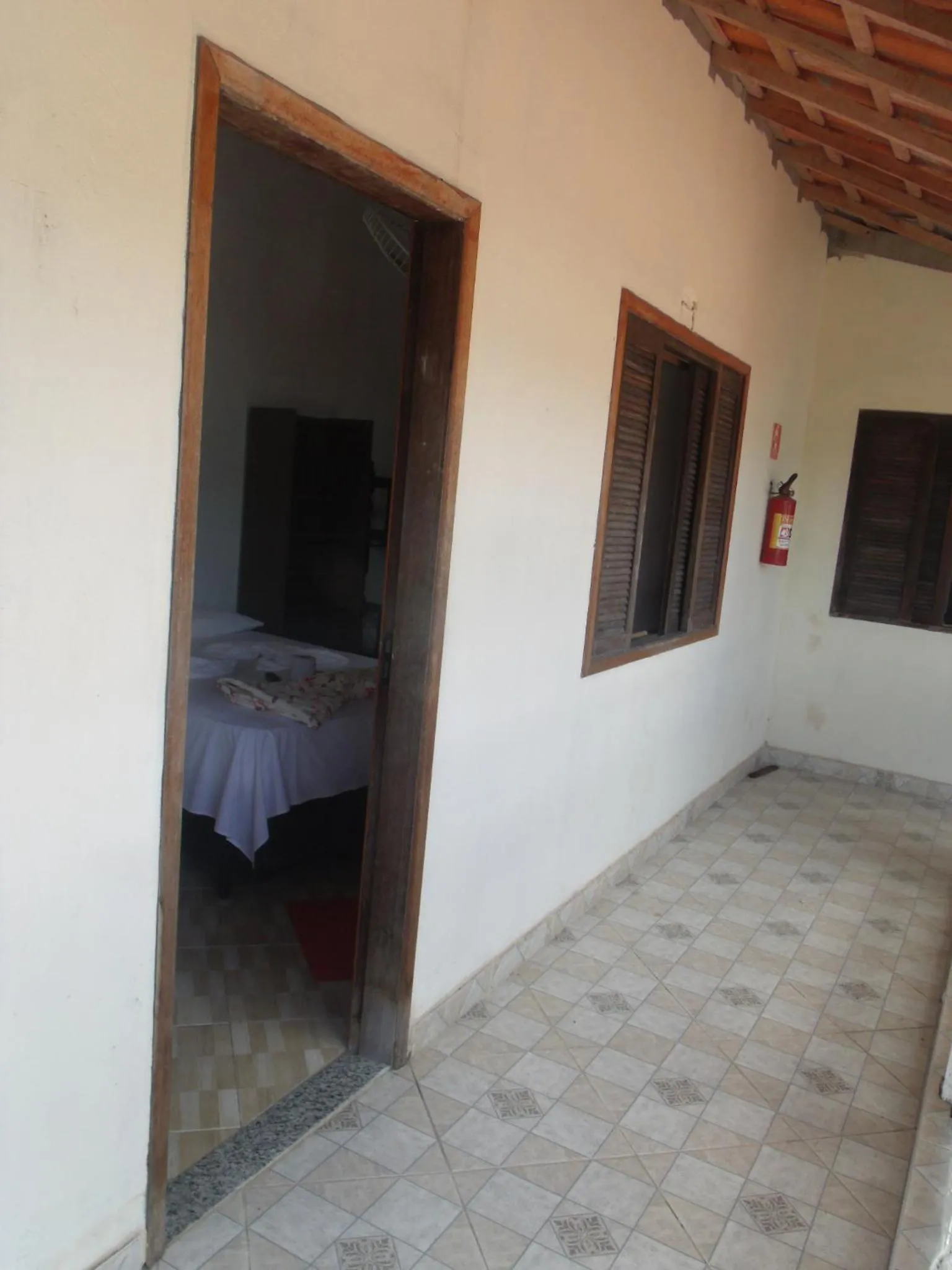 Bed in Pousada Edson