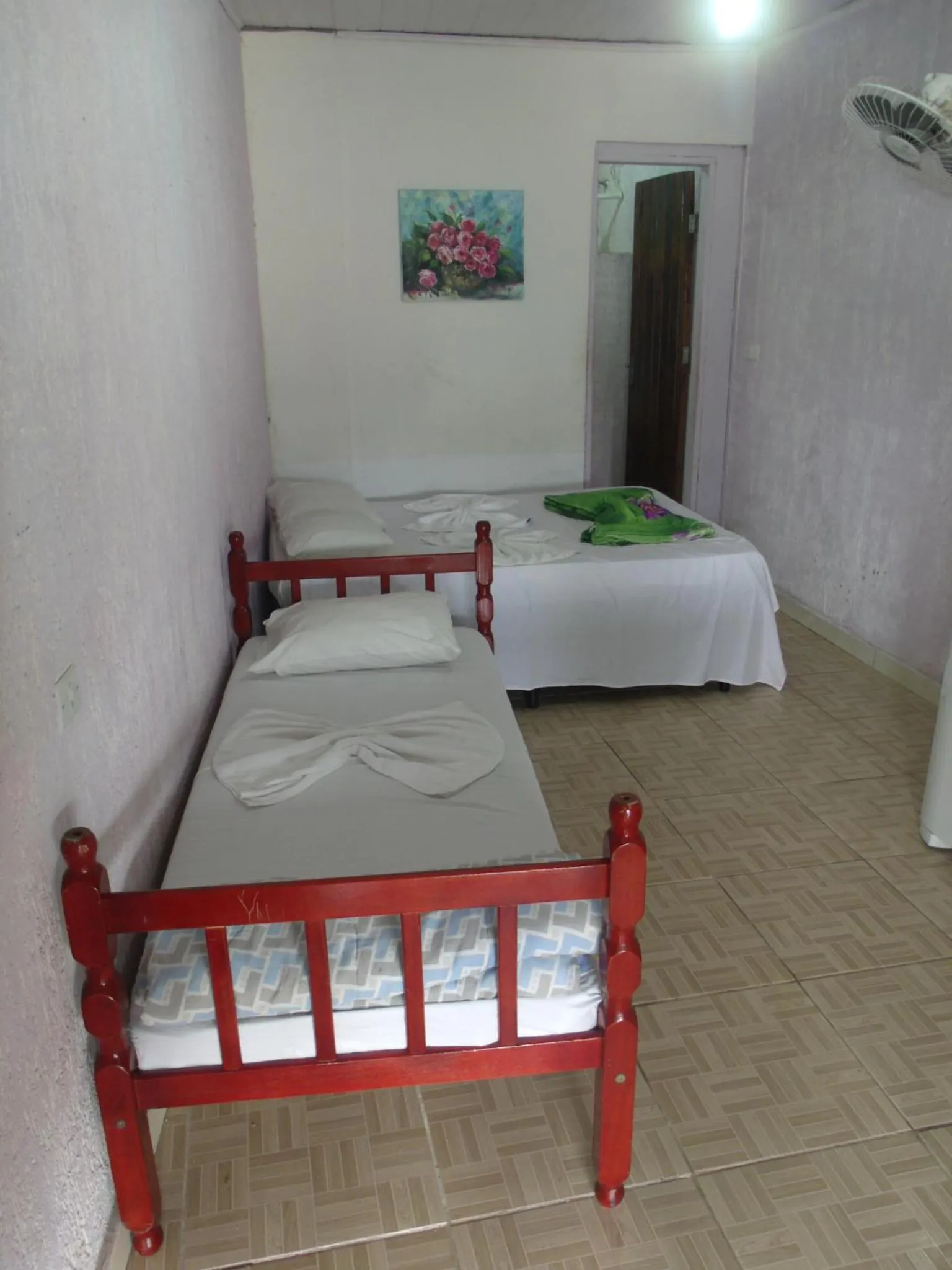 Bed in Pousada Edson