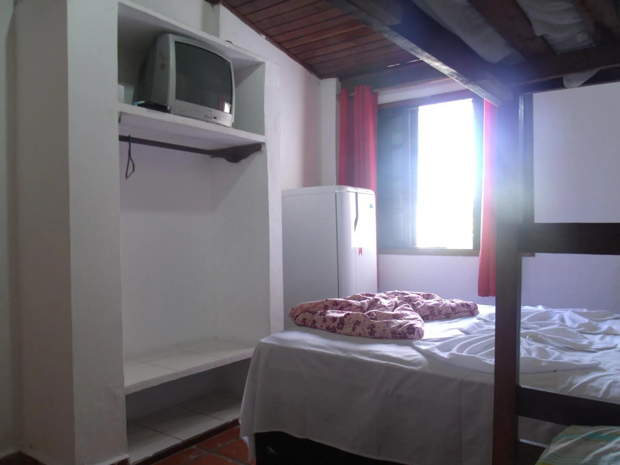 Bed in Pousada Edson