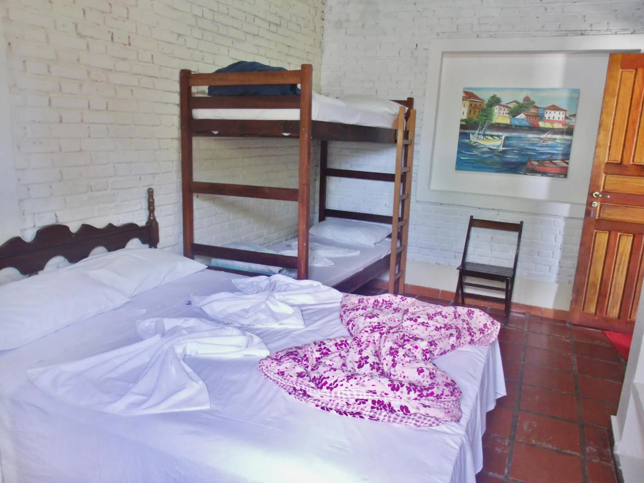 Bed in Pousada Edson