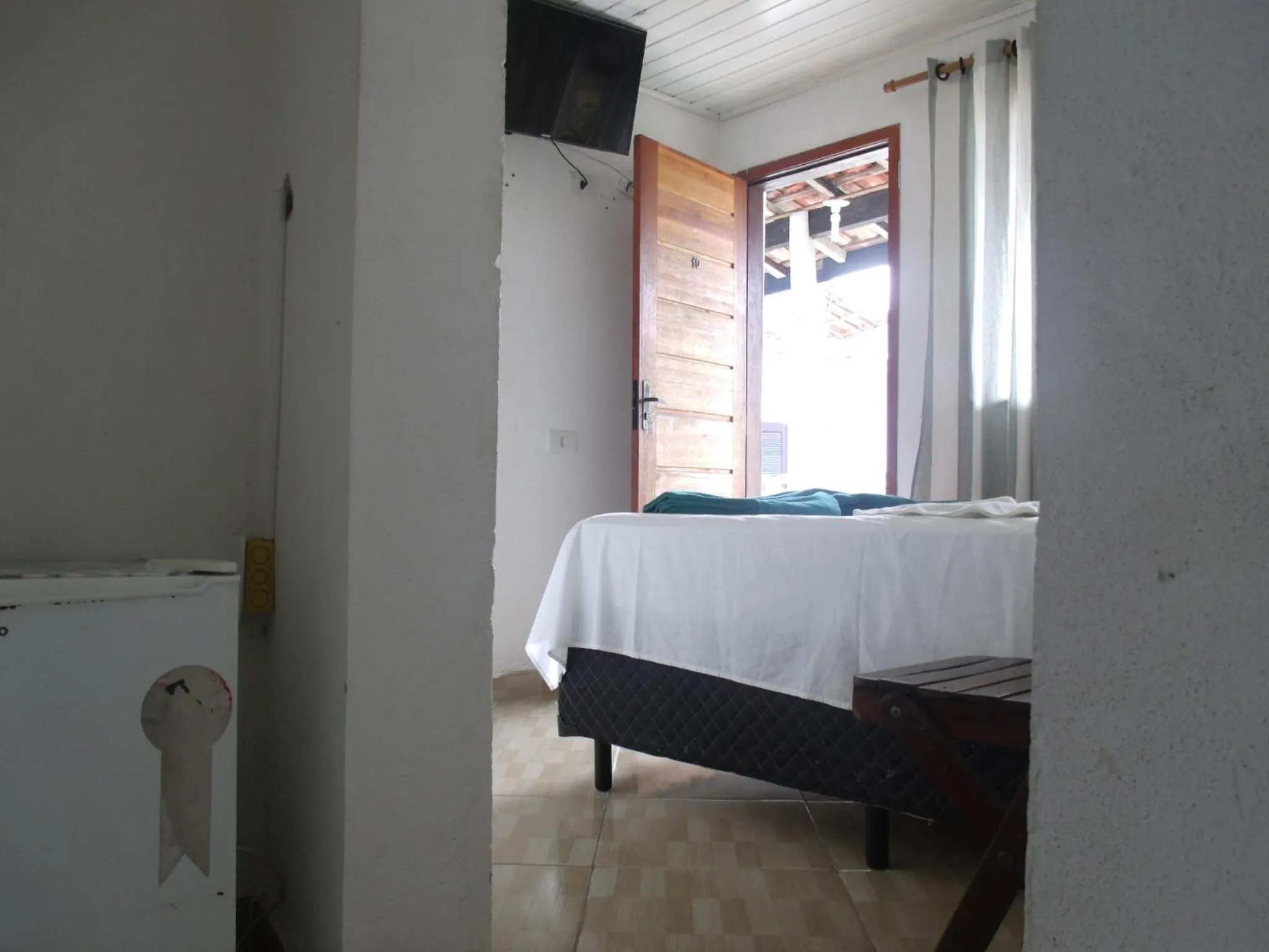 Bed in Pousada Edson