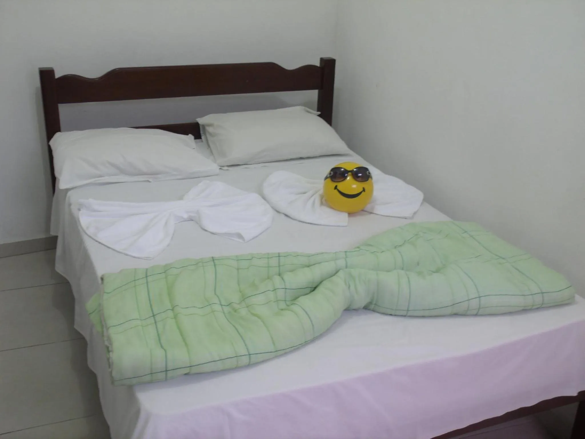 Bed in Pousada Edson