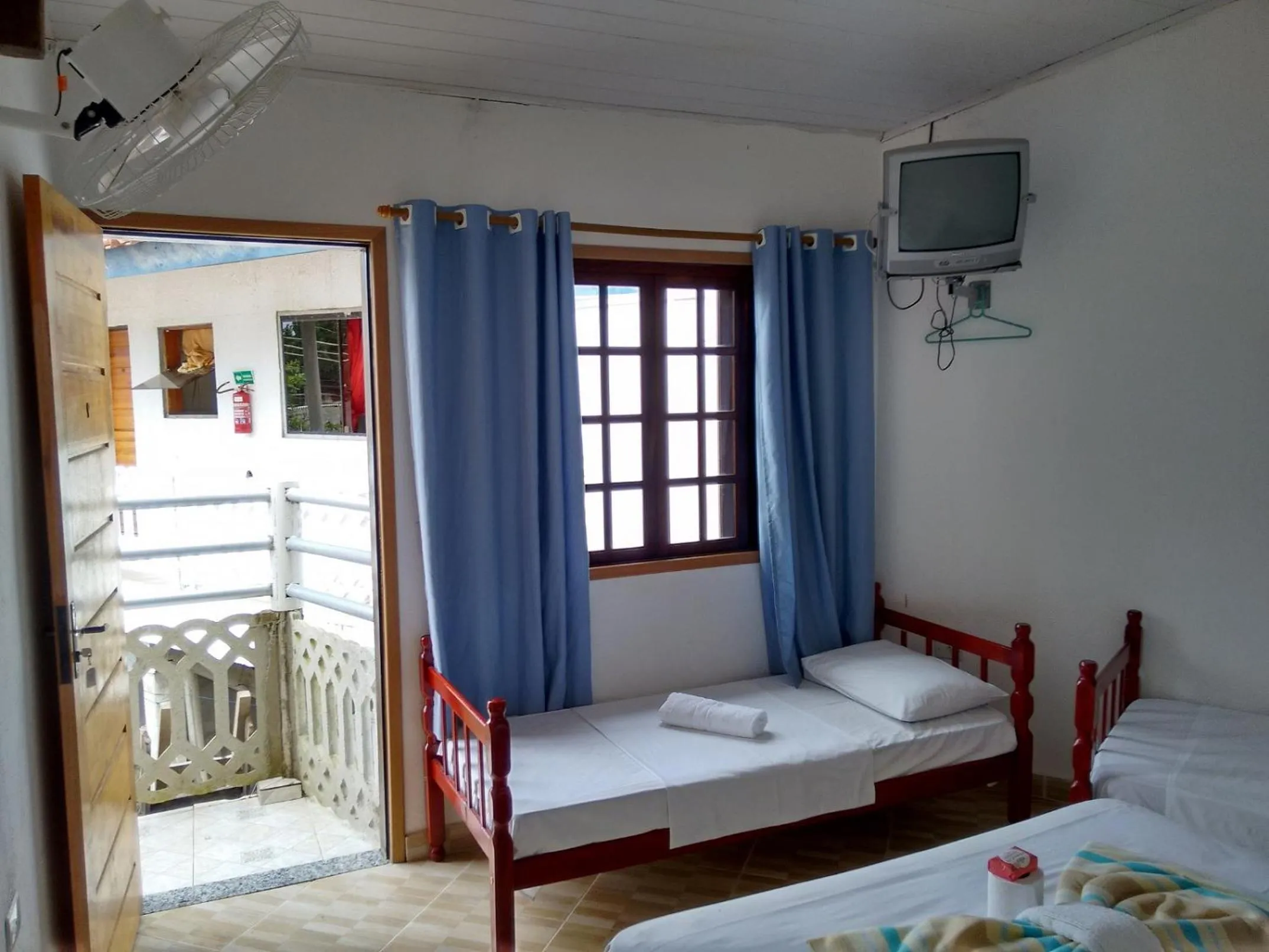 Bed in Pousada Edson