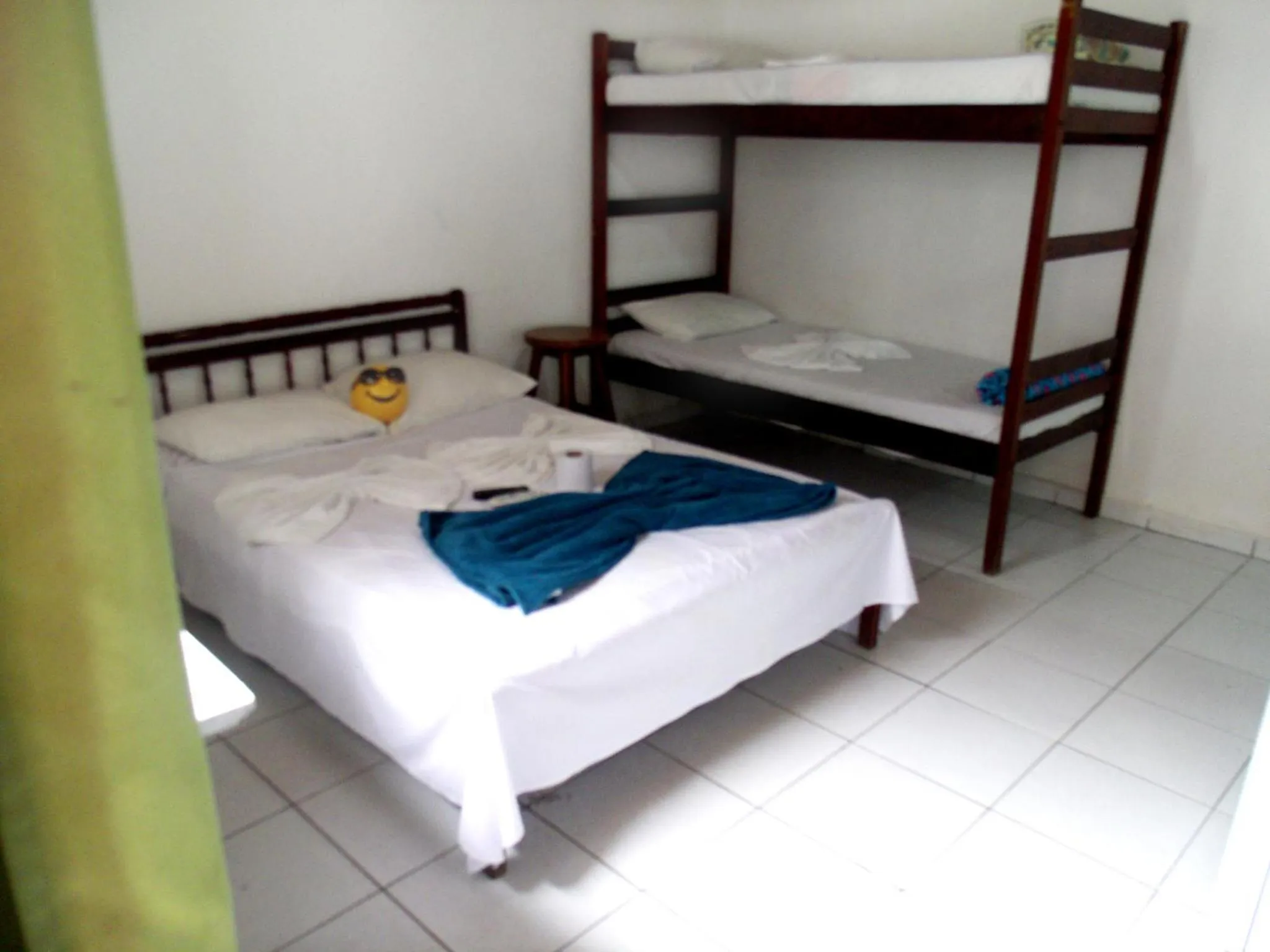 Bed in Pousada Edson