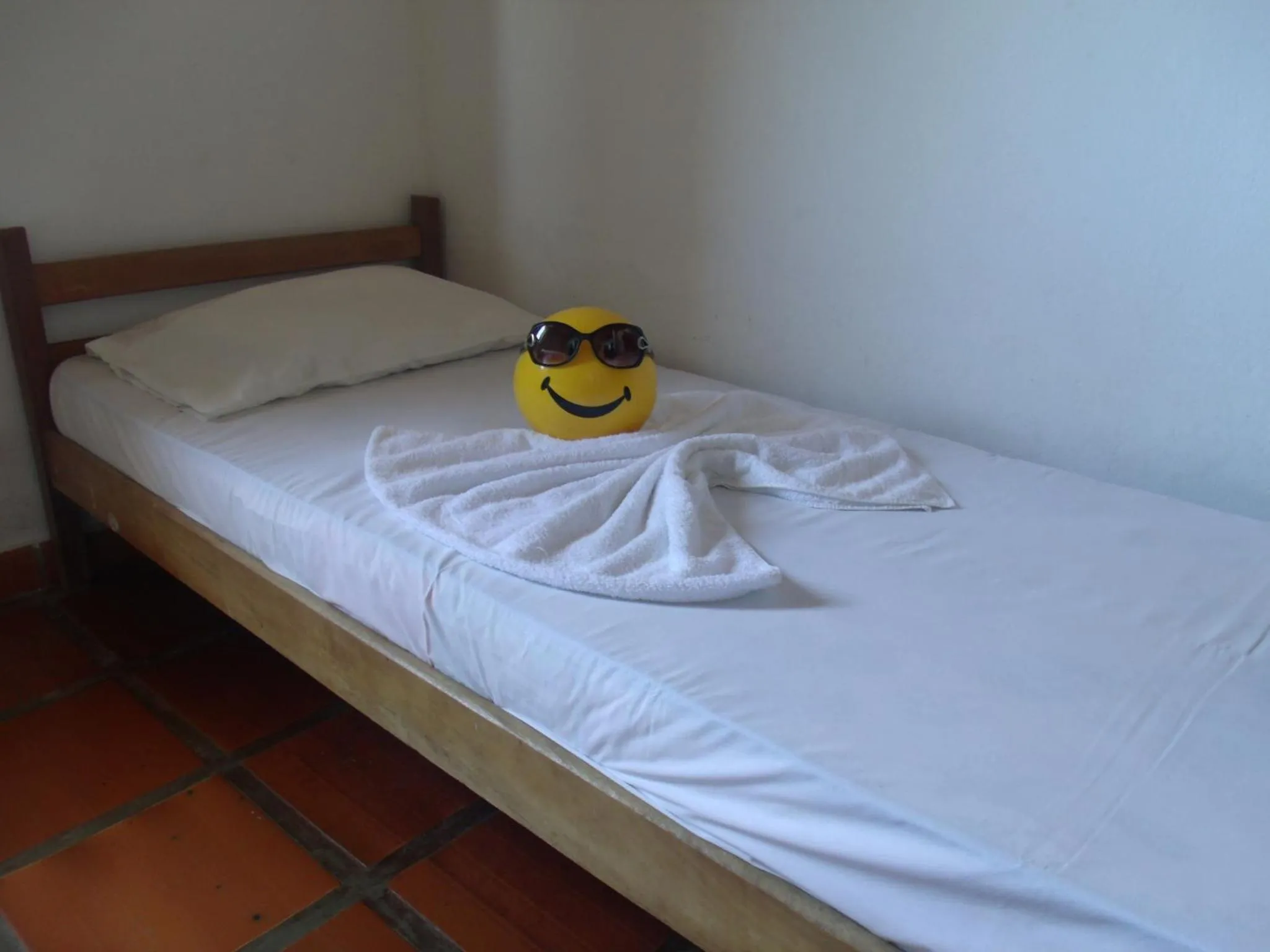 Bed in Pousada Edson